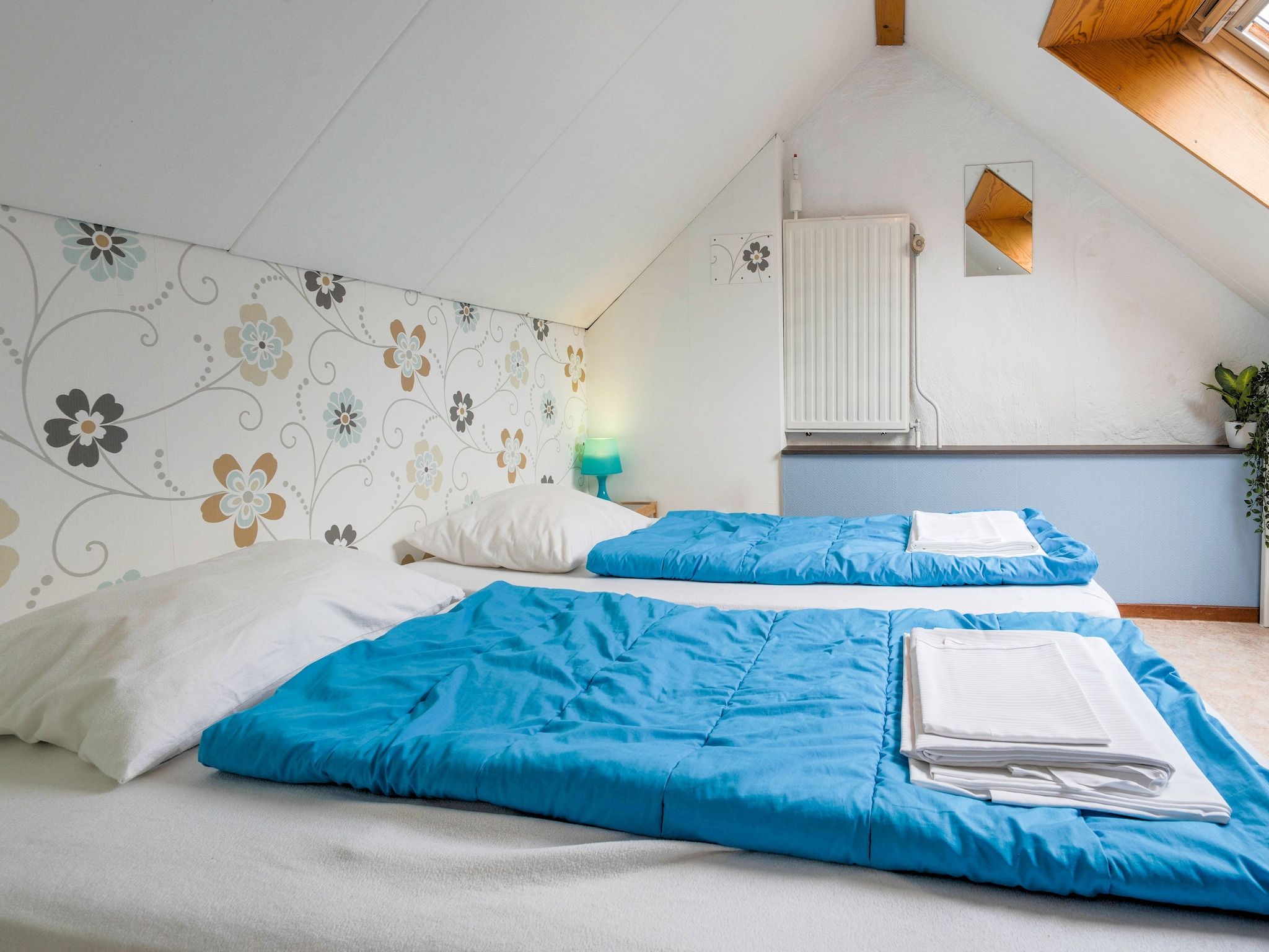 Een slaapkamer van De Wingerd 10P in Ulestraten