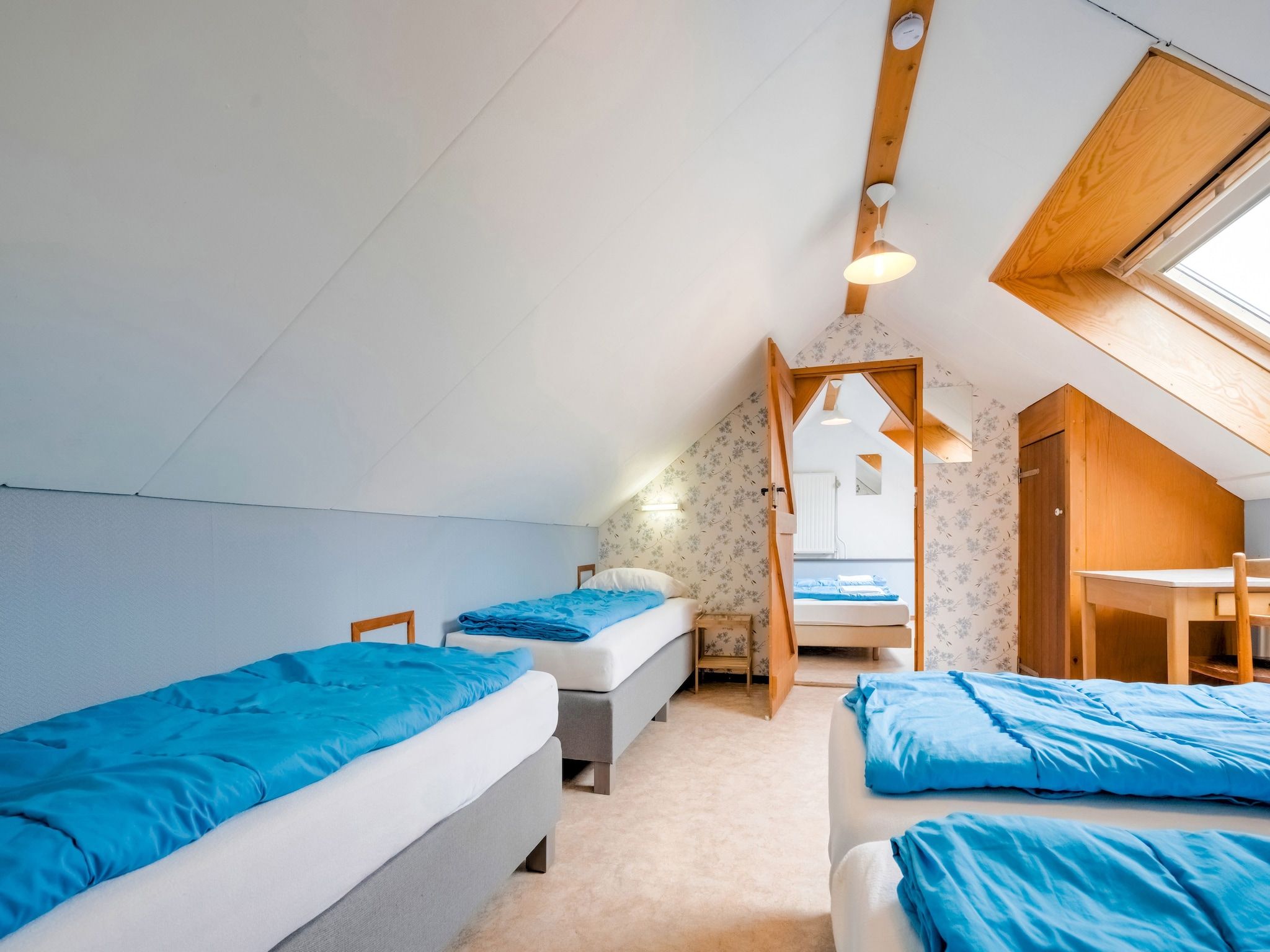 Een slaapkamer van De Wingerd 10P in Ulestraten