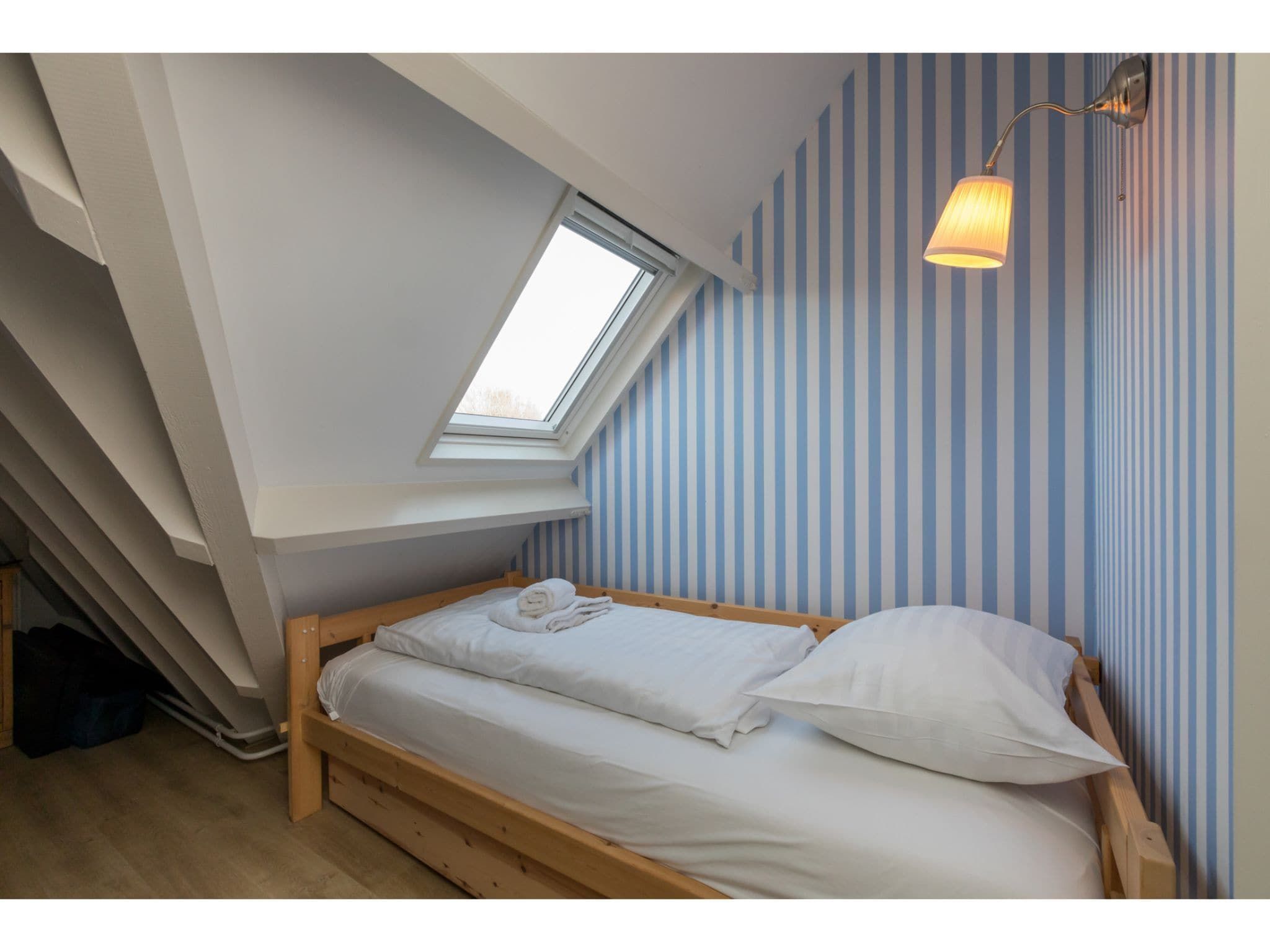 Een slaapkamer van Duinweg 117-4 Duinoord in Zoutelande