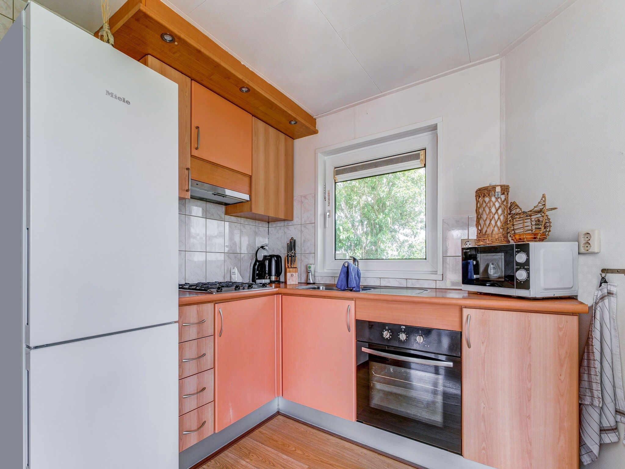 De keuken van Knus chalet in Friesland met hottub in Suwald