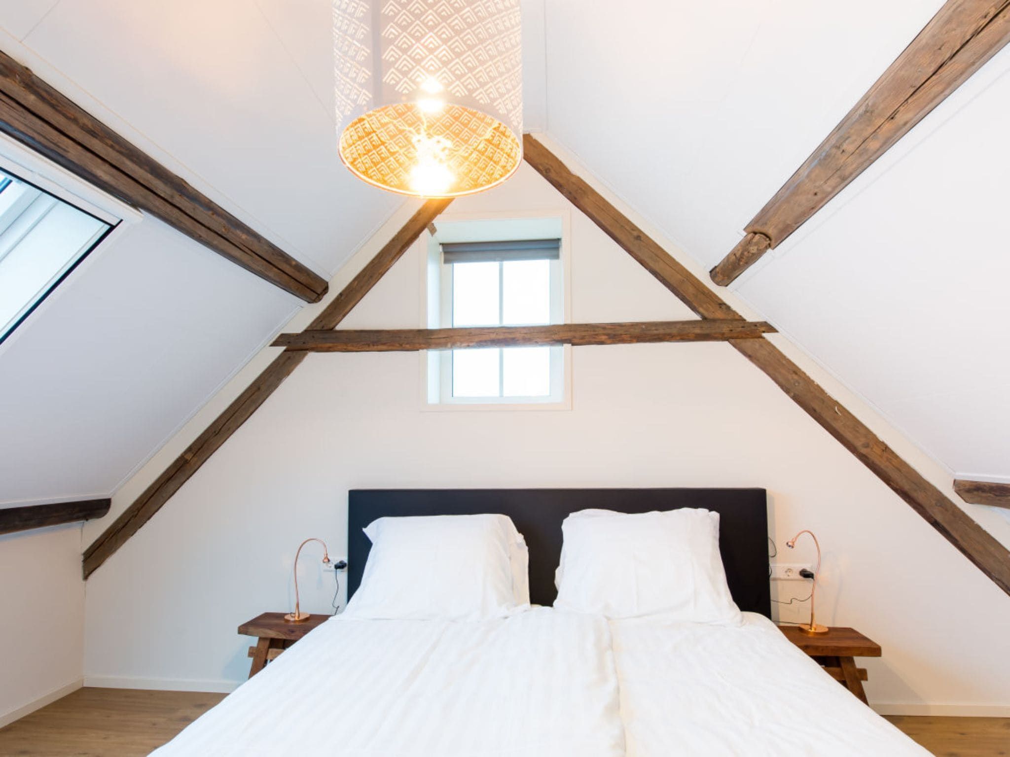 Een slaapkamer van Zoutelandseweg 2 Biggekerke in Biggekerke