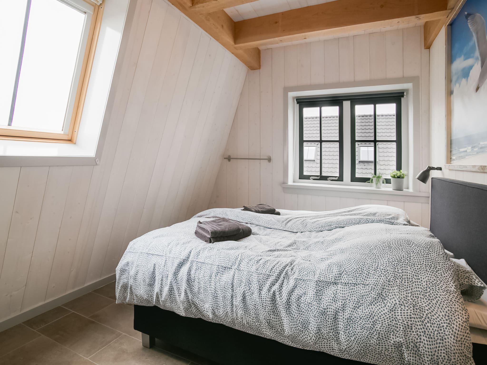 Een slaapkamer van Hazenborgh - Duinhuis 1 in Callantsoog