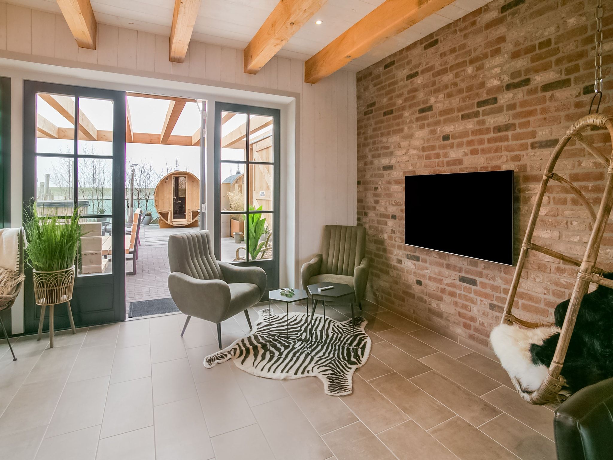 De woonkamer van Hazenborgh - Duinhuis 1 in Callantsoog