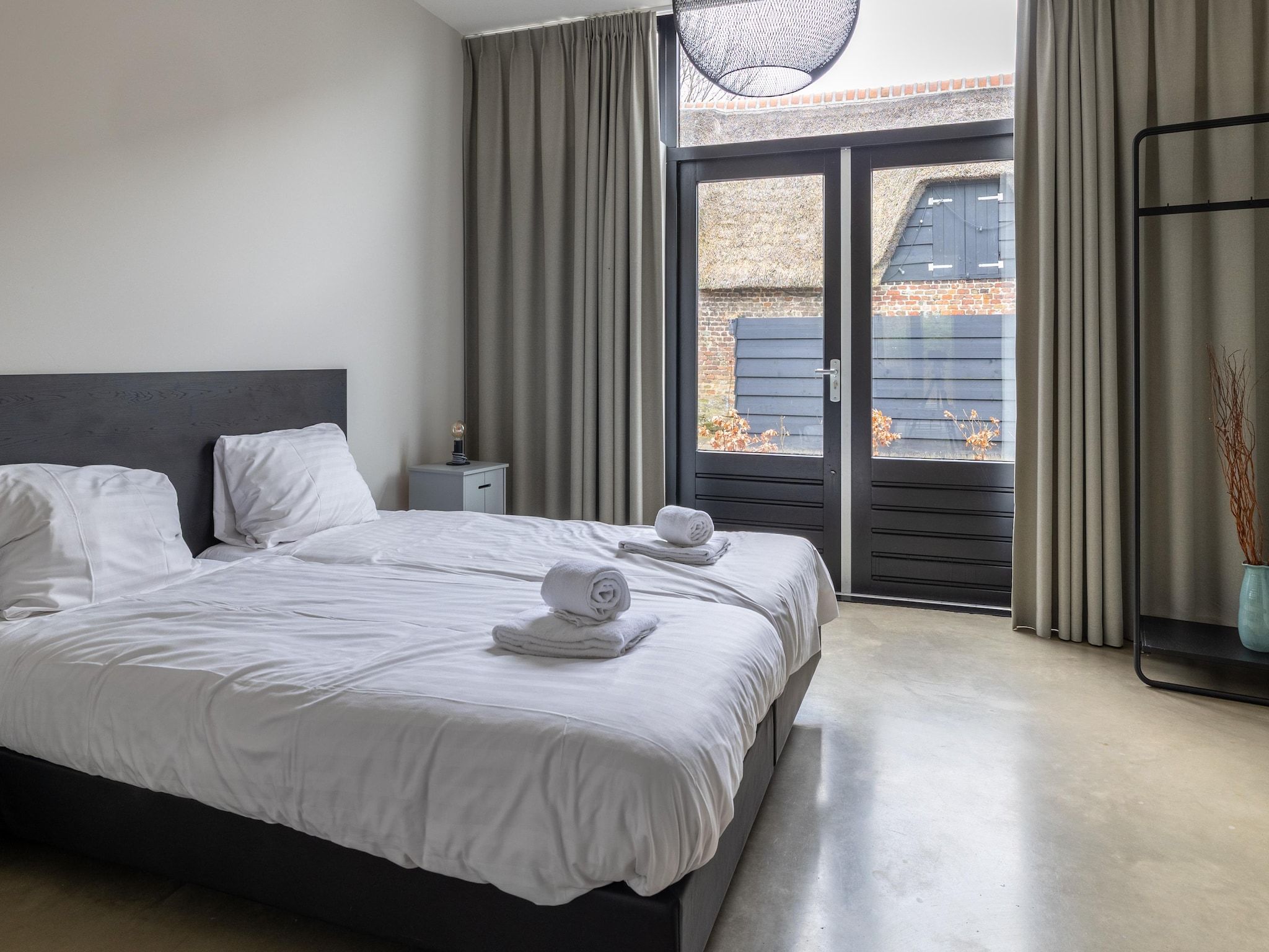 Een slaapkamer van Oranjezon app 6p in Vrouwenpolder
