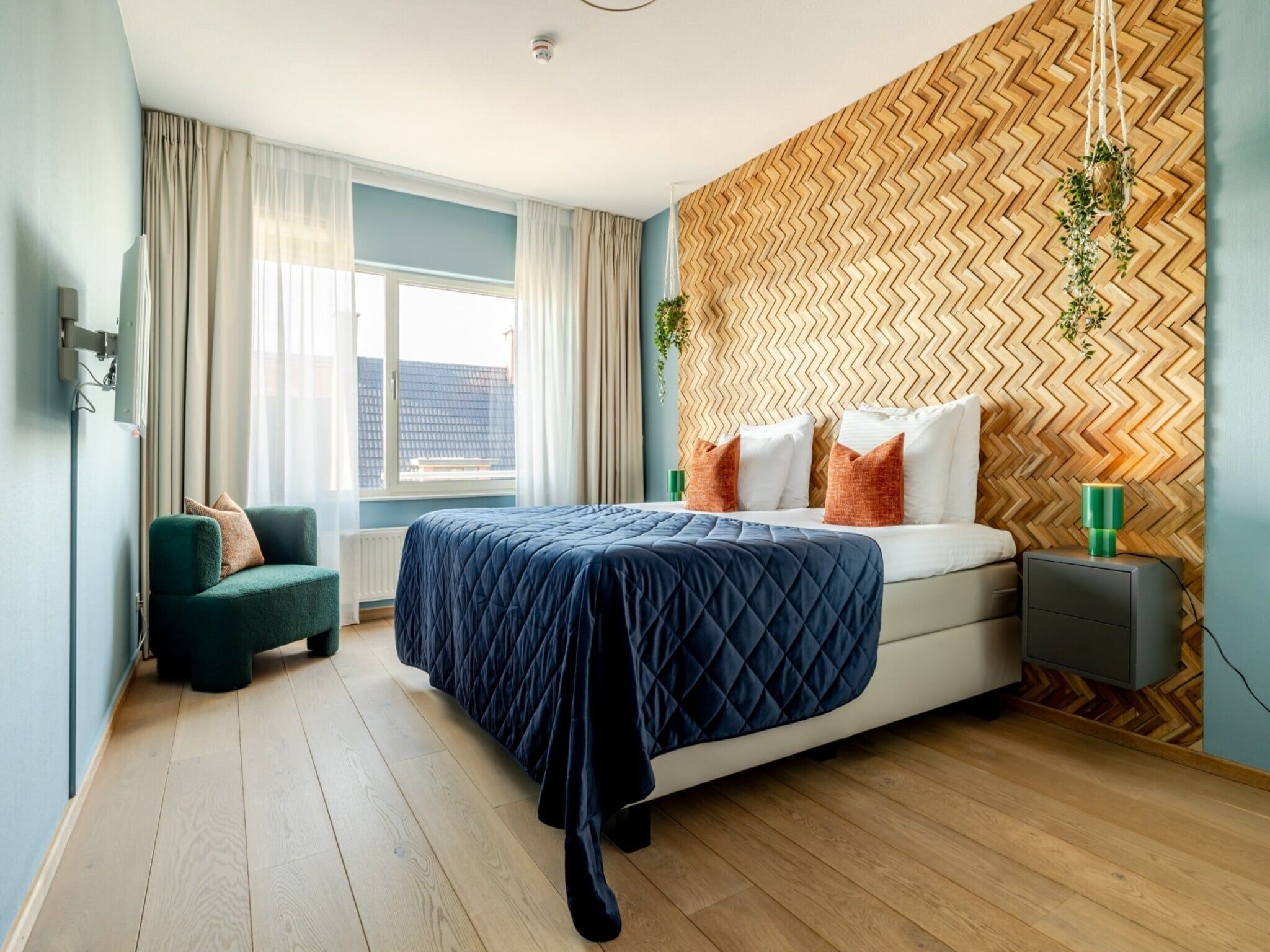 Een slaapkamer van Scheveningen Harbour 10B in Den Haag