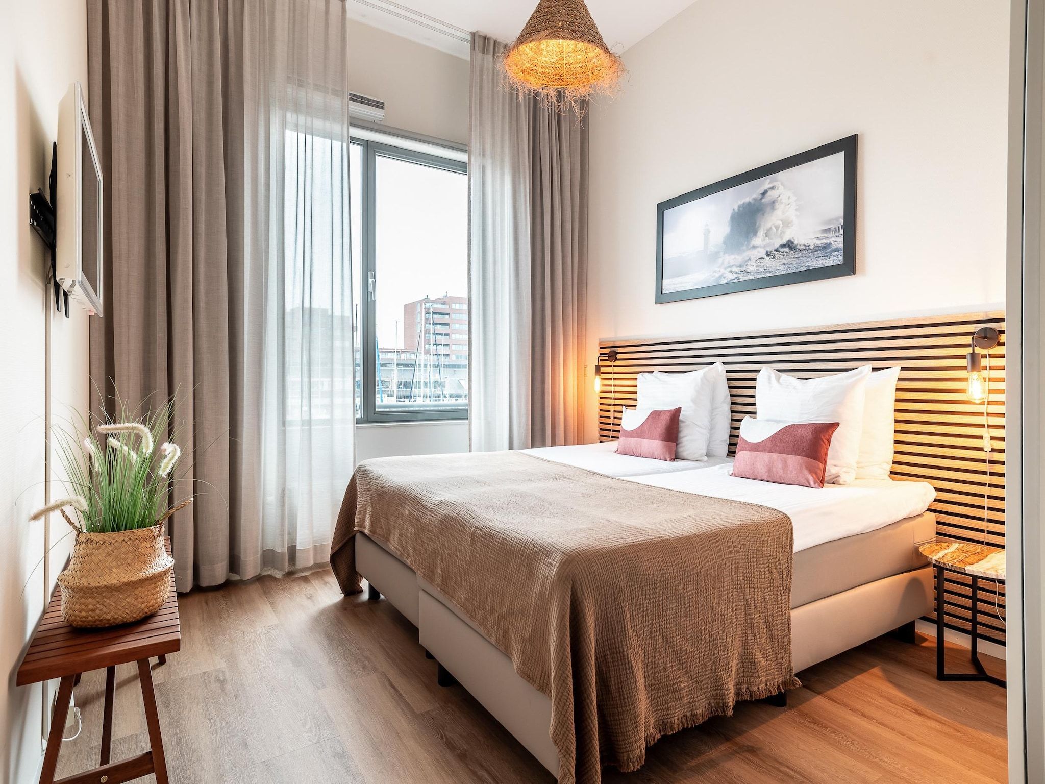 Een slaapkamer van Scheveningen Harbour 56 in Den Haag