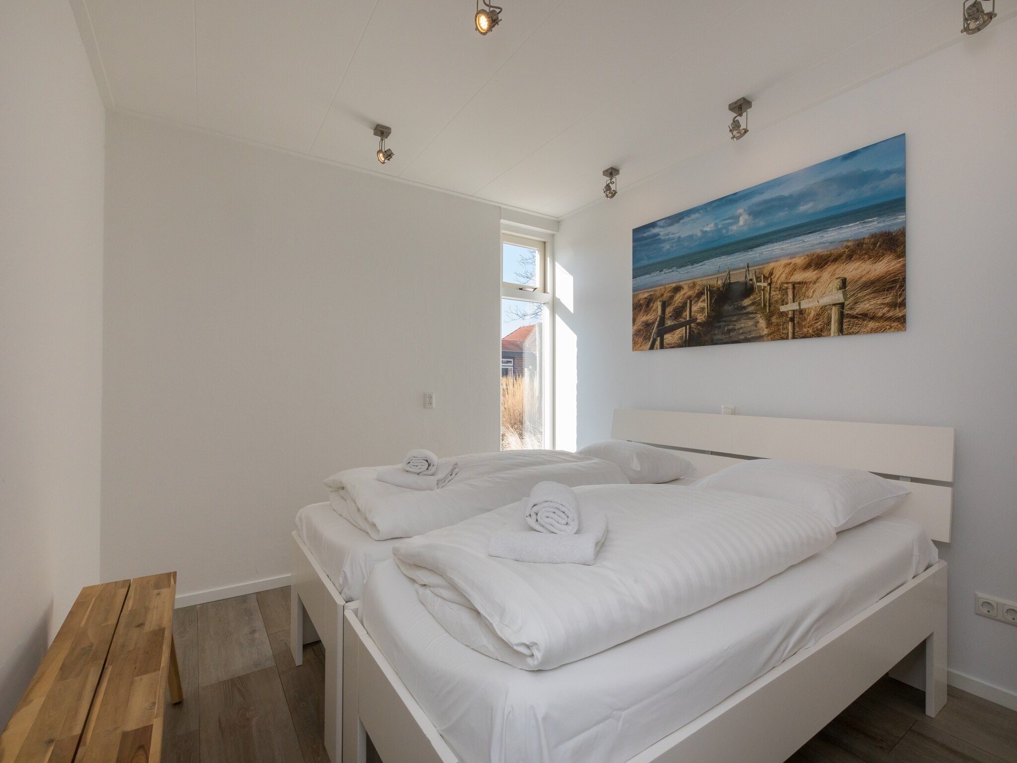 Een slaapkamer van Oostkapelseweg 32 -Ooievaar in Serooskerke