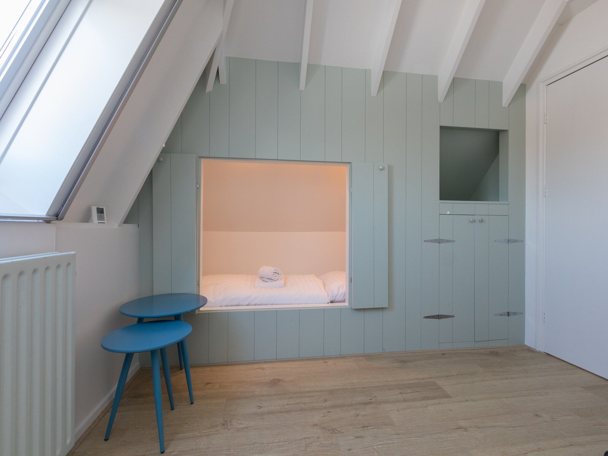 Een slaapkamer van Oostkapelseweg 32 -Ooievaar in Serooskerke