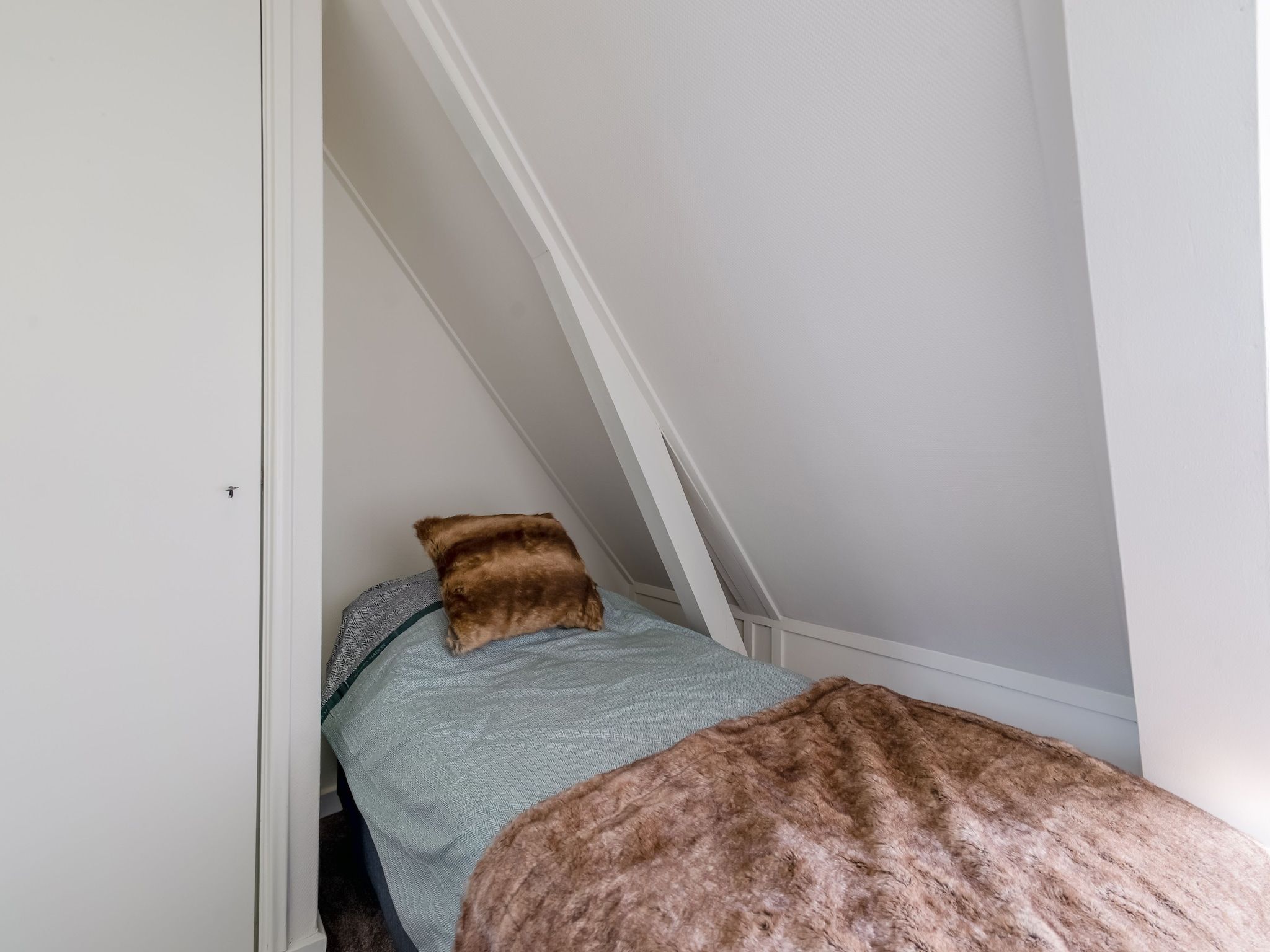 Een slaapkamer van B&B boerderij GRUTSK in Suwald