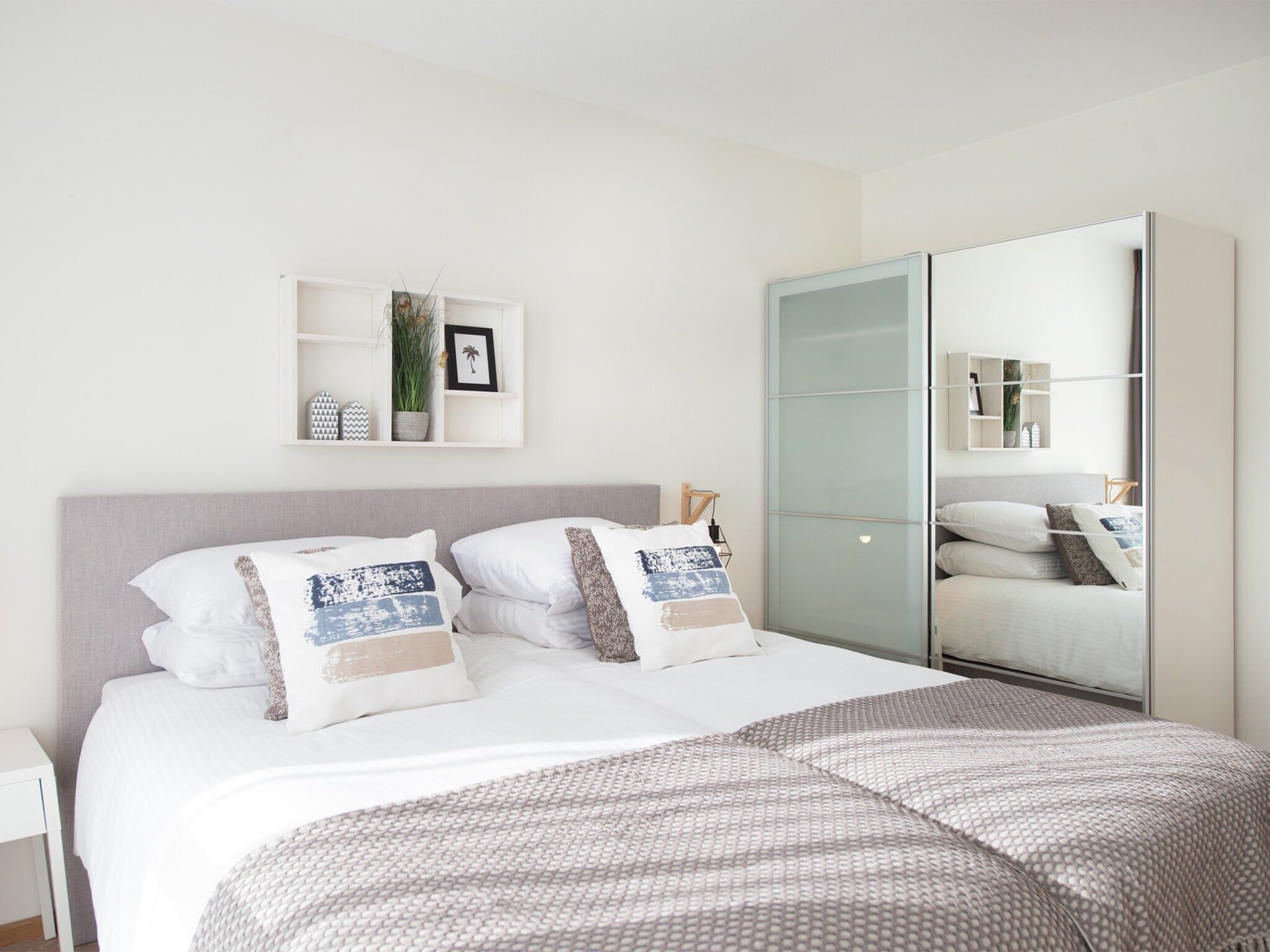 Een slaapkamer van Scheveningen Harbour 28B in Den Haag