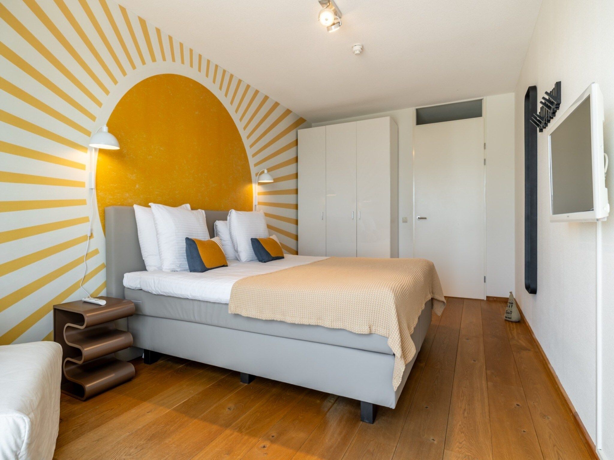 Een slaapkamer van Scheveningen Harbour 32 in Den Haag