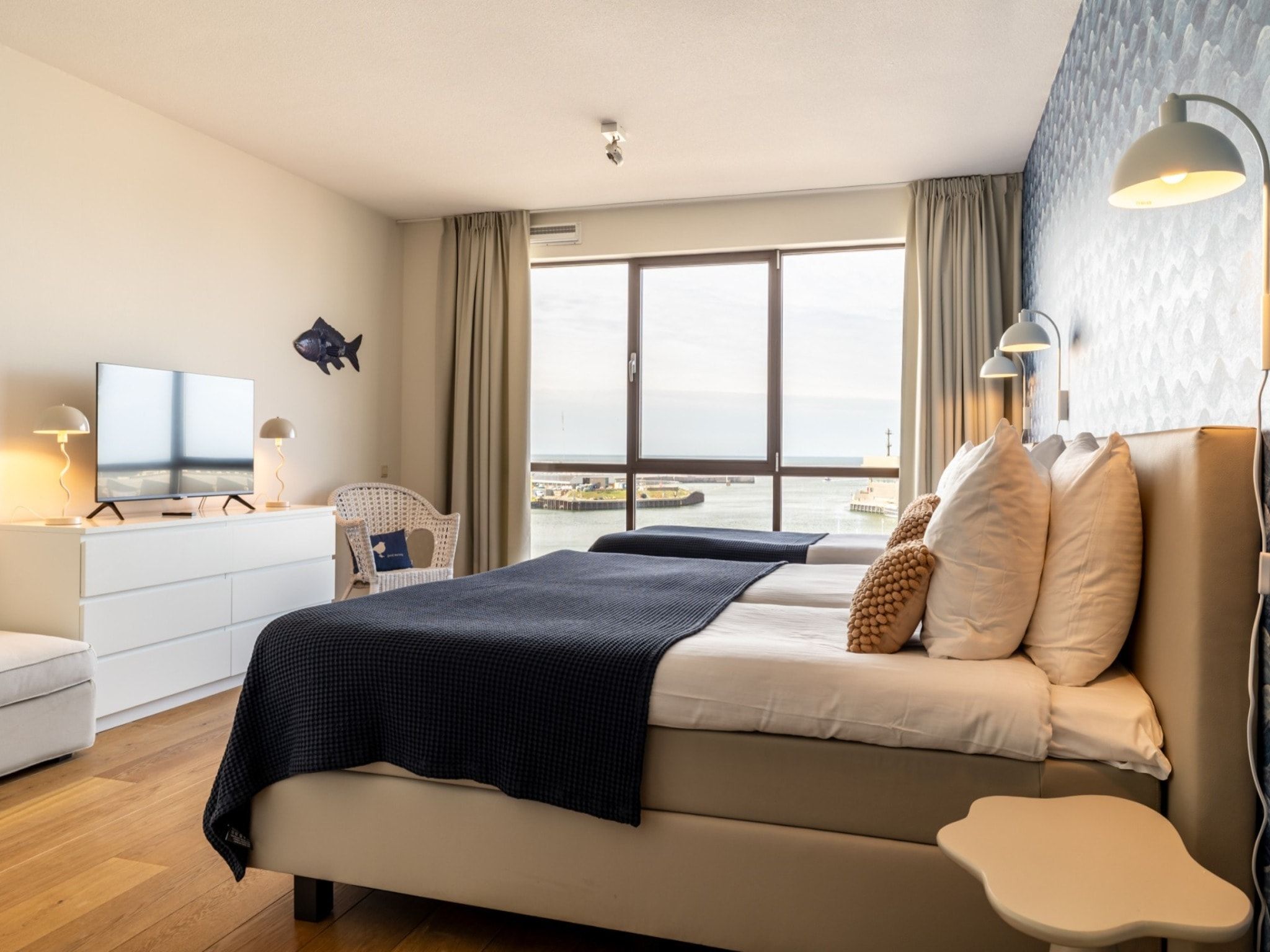 Een slaapkamer van Scheveningen Harbour 32 in Den Haag
