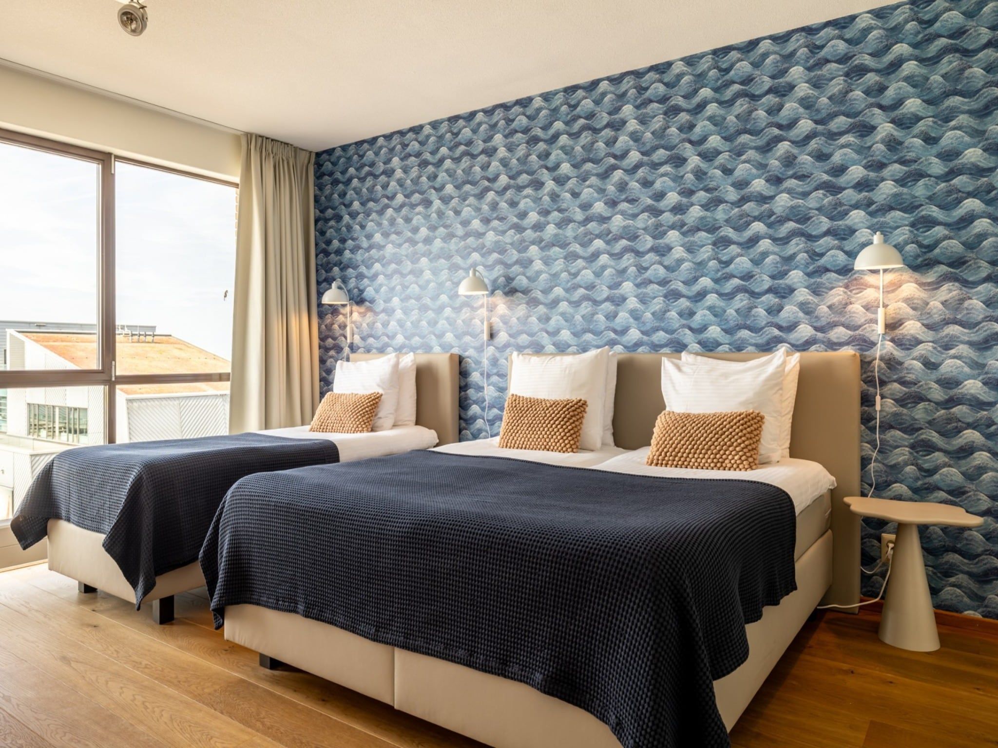 Een slaapkamer van Scheveningen Harbour 32 in Den Haag