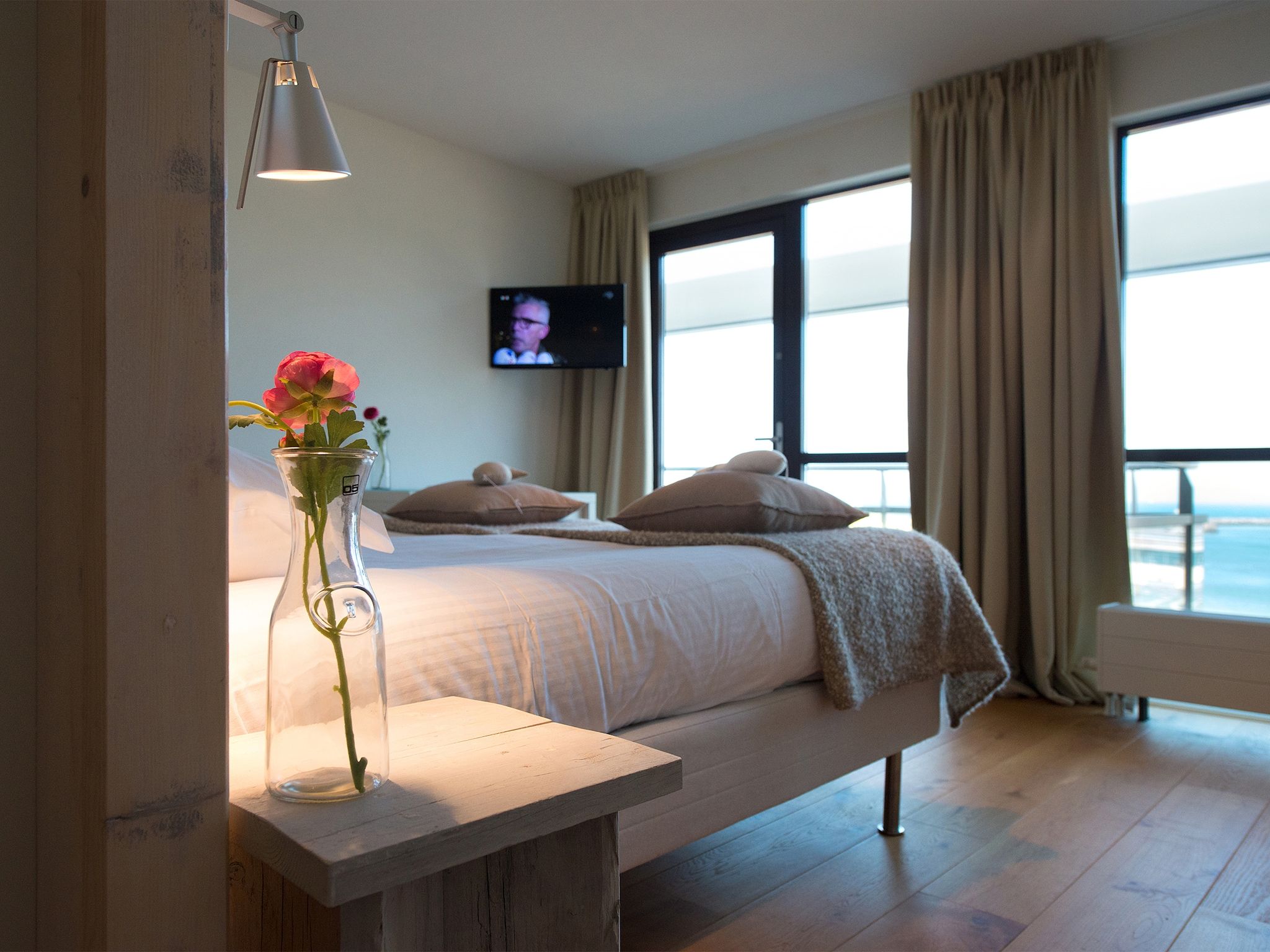 Een slaapkamer van Scheveningen Harbour 32C in Den Haag