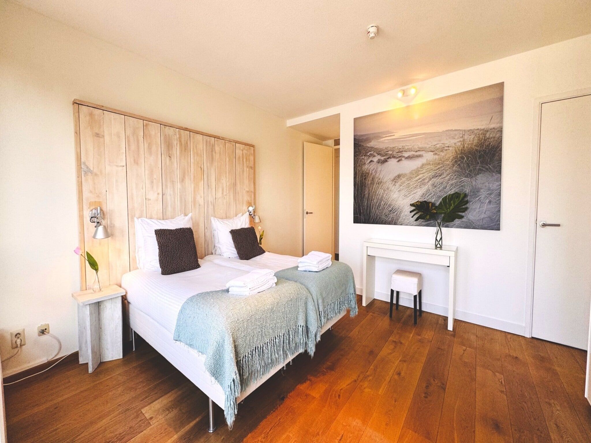 Een slaapkamer van Scheveningen Harbour 32C in Den Haag