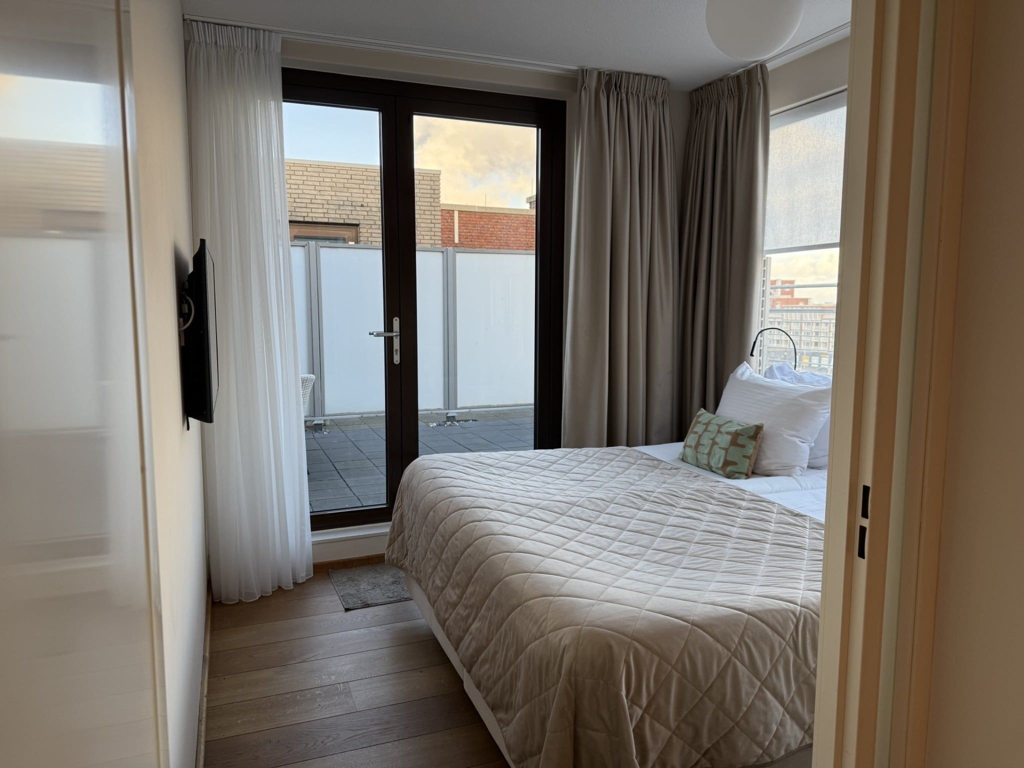 Een slaapkamer van Scheveningen Harbour 42A in Den Haag
