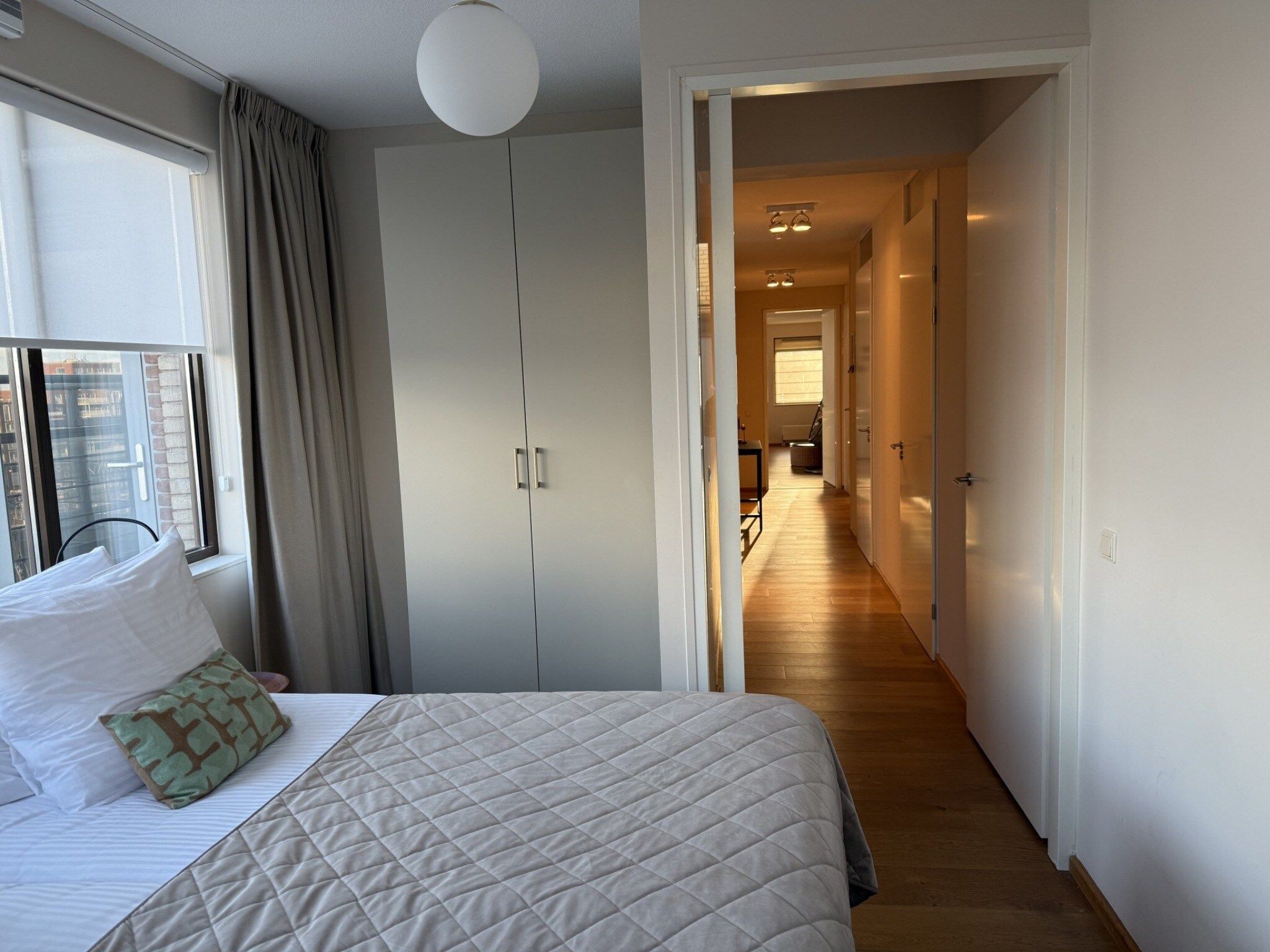 Een slaapkamer van Scheveningen Harbour 42A in Den Haag