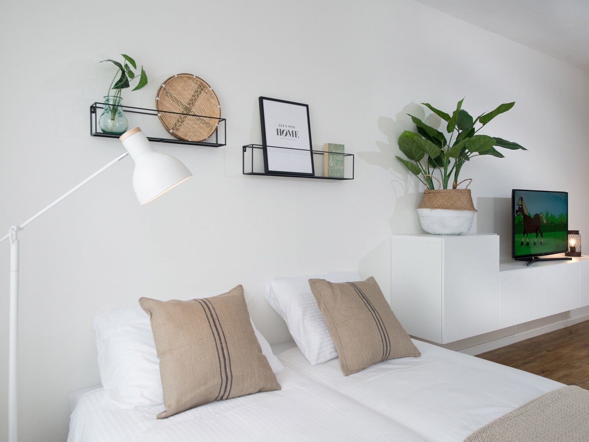 Een slaapkamer van Scheveningen Harbour 48A in Den Haag