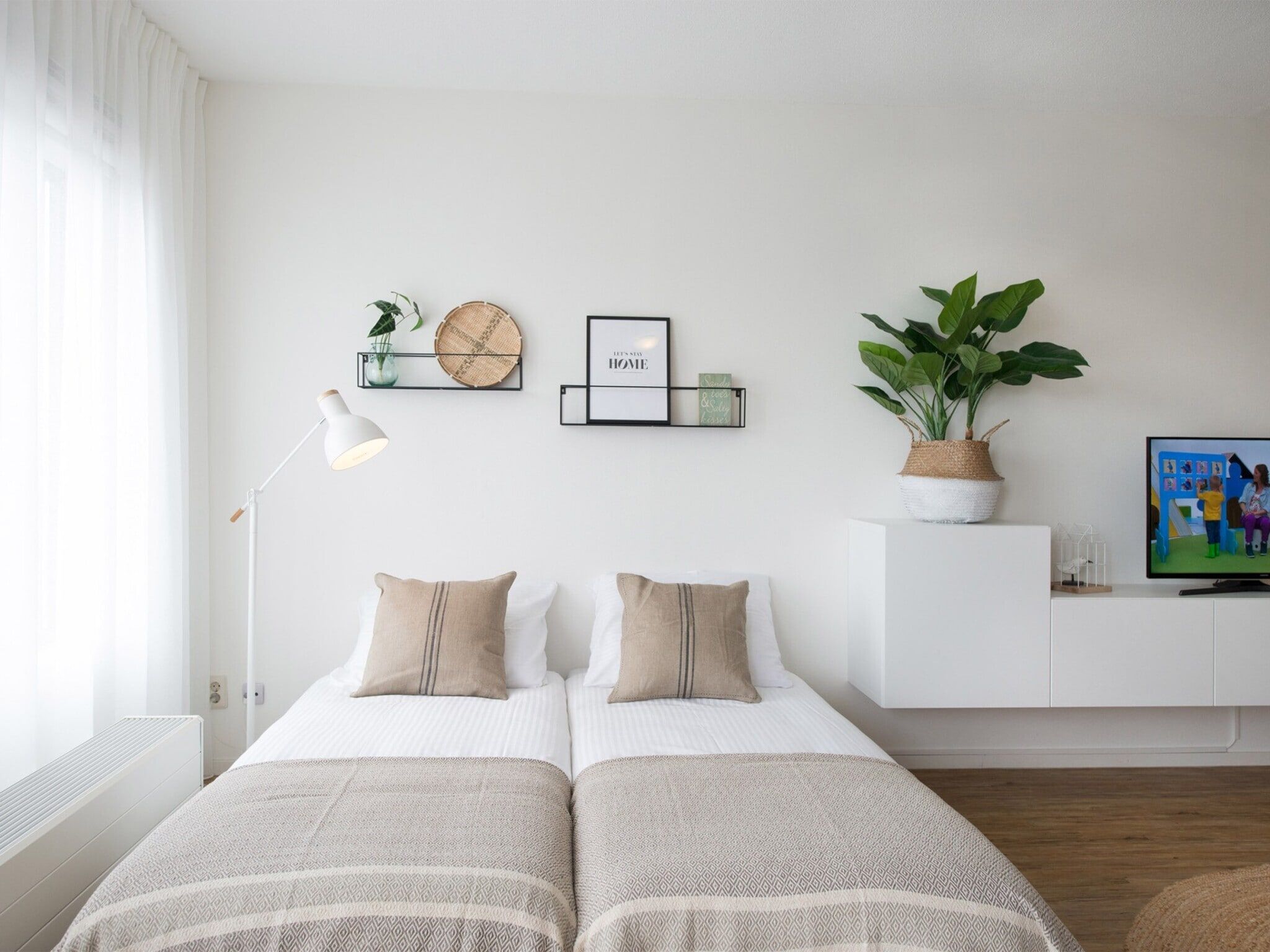 Een slaapkamer van Scheveningen Harbour 48A in Den Haag