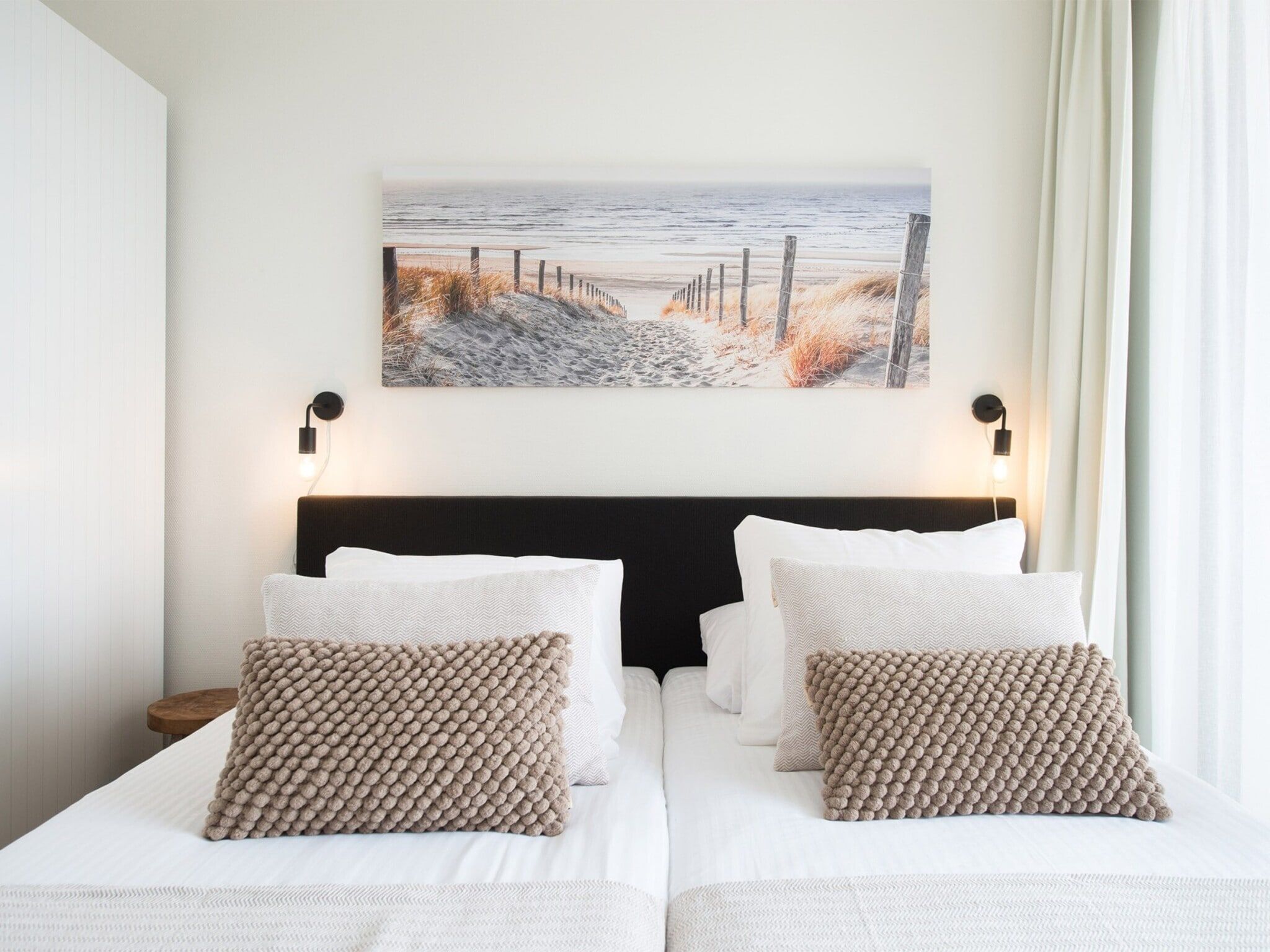 Een slaapkamer van Scheveningen Harbour 48A in Den Haag