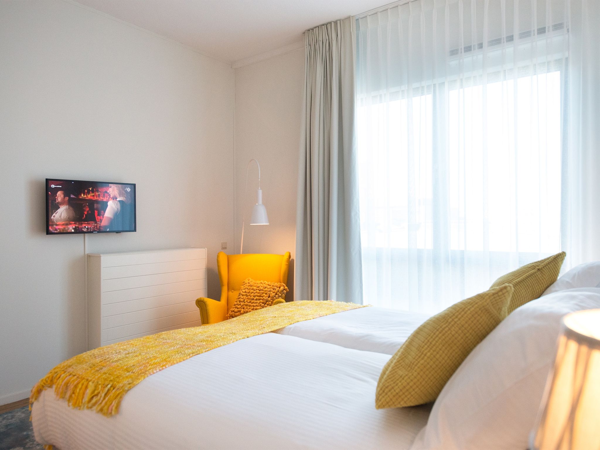 Een slaapkamer van Scheveningen Harbour 54 in Den Haag