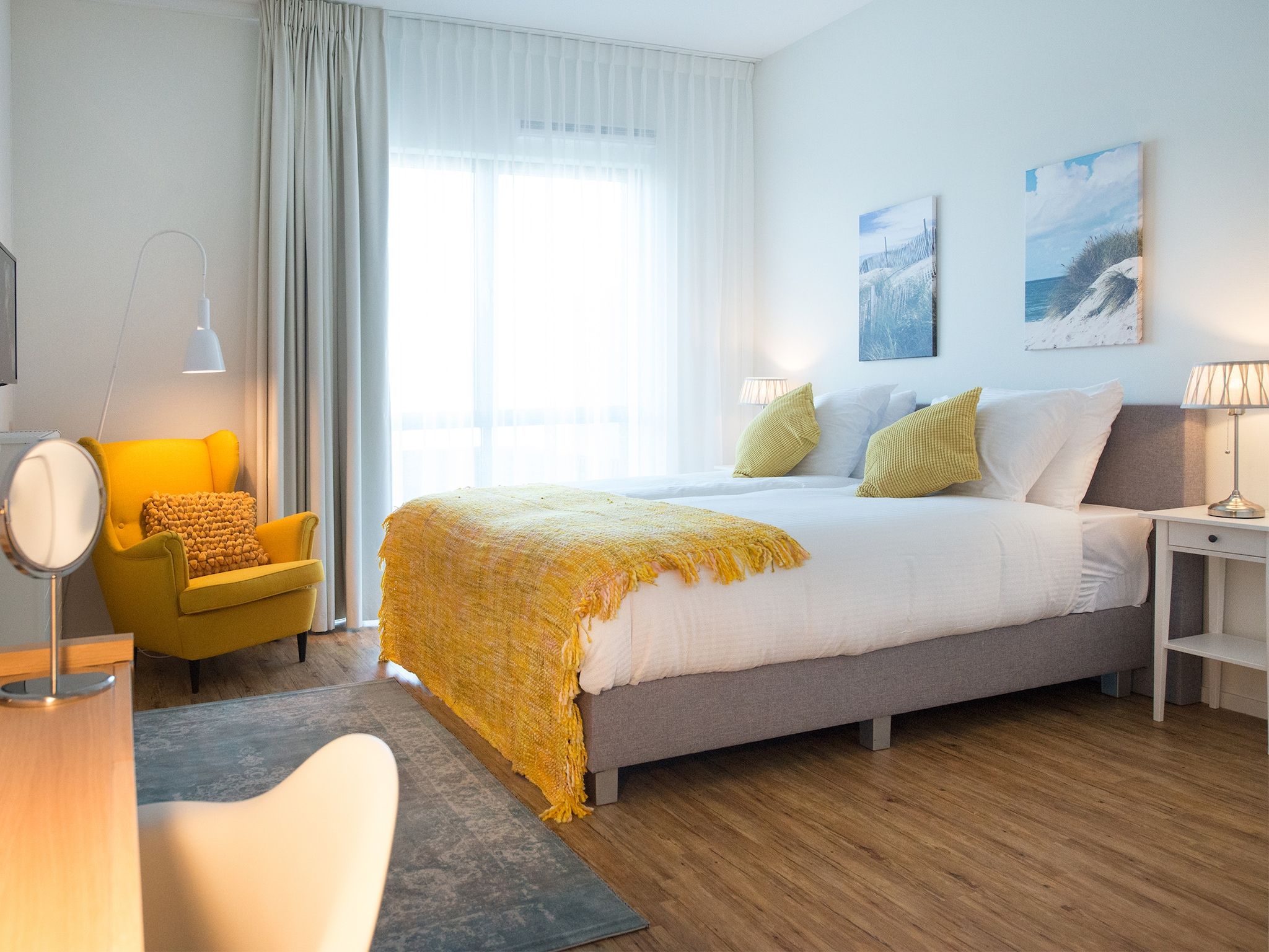 Een slaapkamer van Scheveningen Harbour 54 in Den Haag
