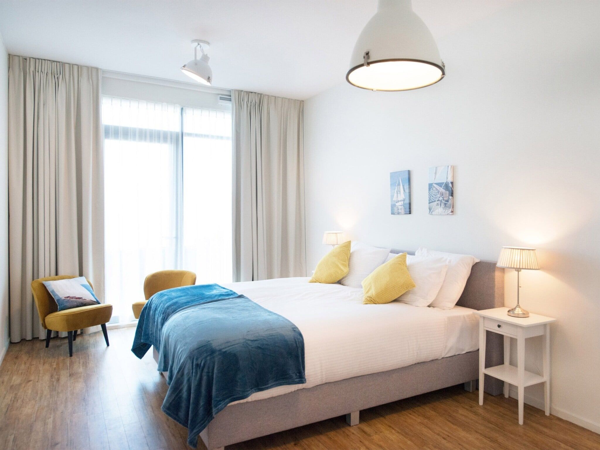Een slaapkamer van Scheveningen Harbour 54 in Den Haag