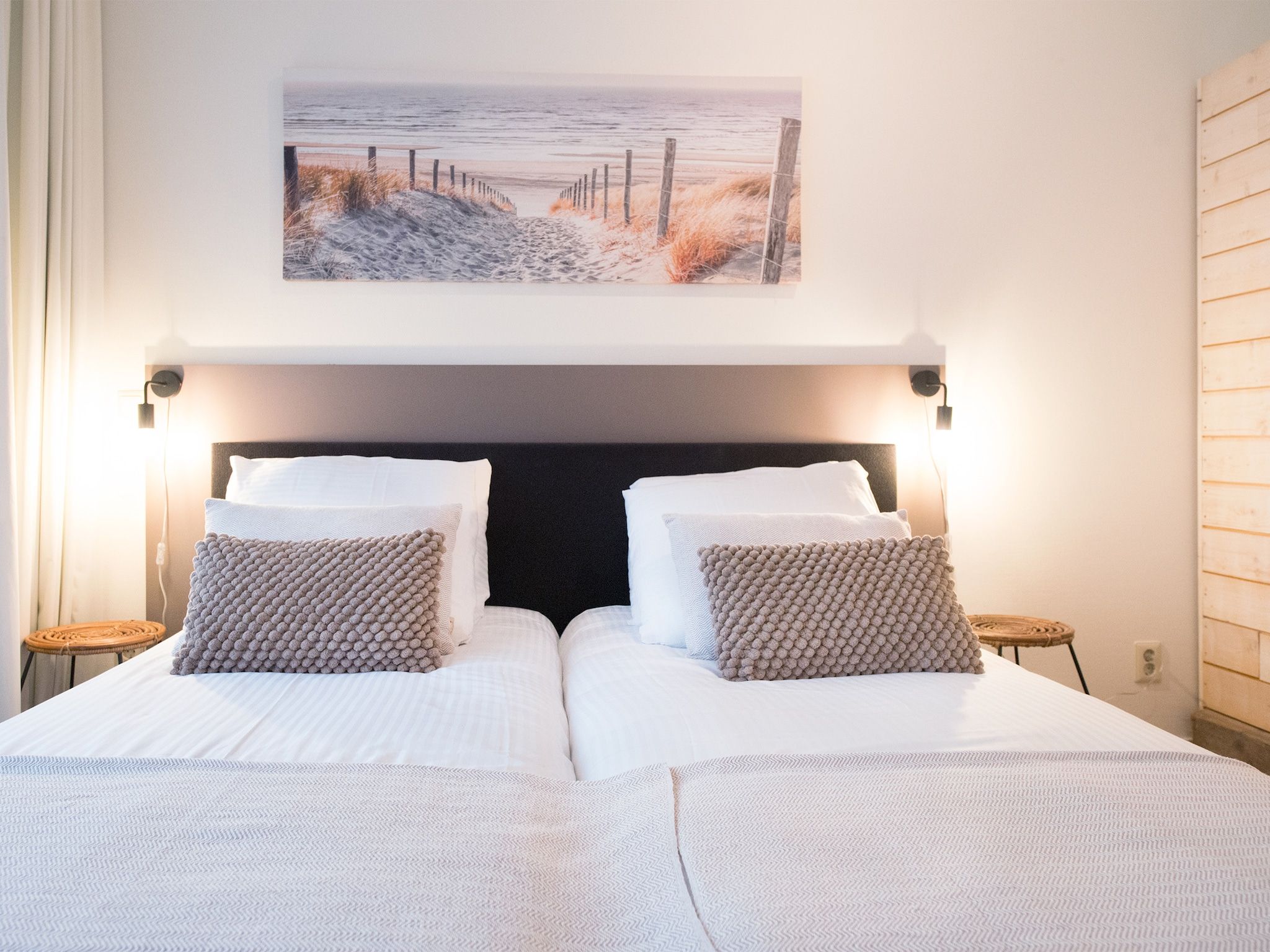 Een slaapkamer van Scheveningen Harbour 56C in Den Haag