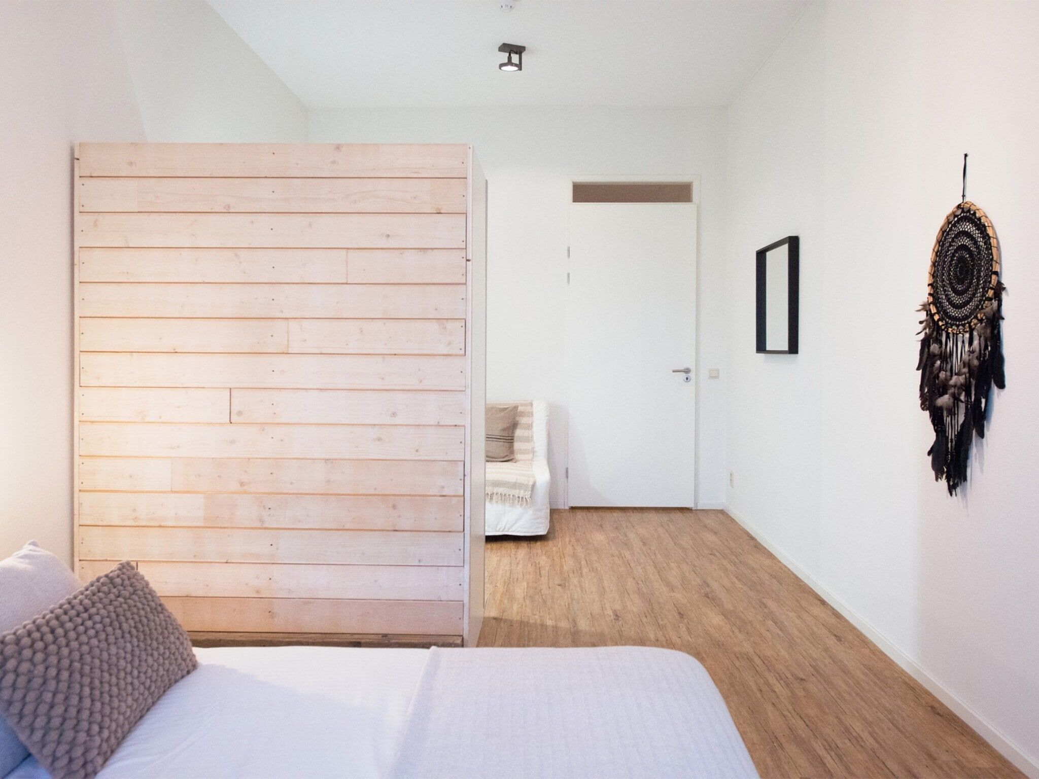 Een slaapkamer van Scheveningen Harbour 56C in Den Haag