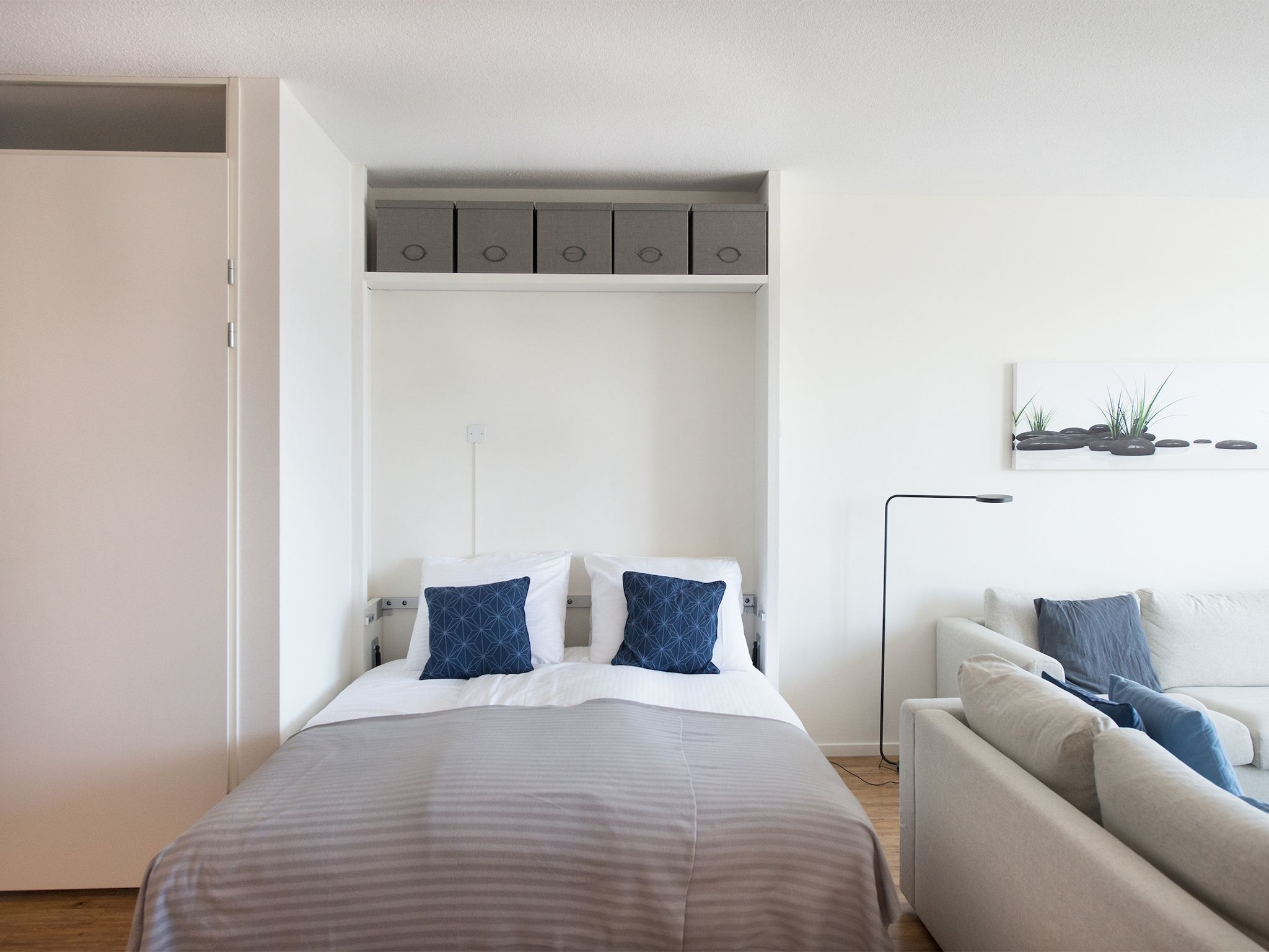 Een slaapkamer van Scheveningen Harbour 58C in Den Haag