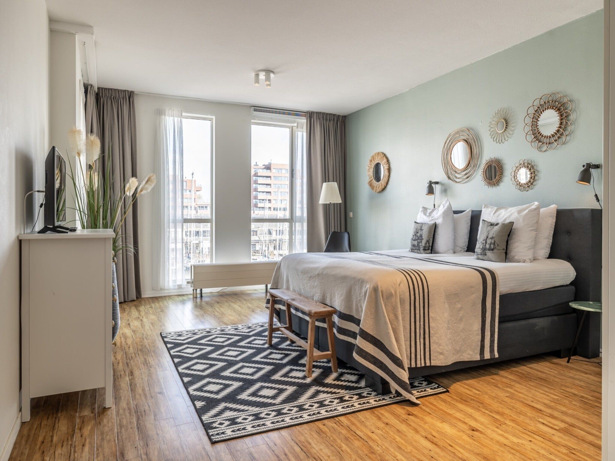 Een slaapkamer van Scheveningen Harbour 60B in Den Haag