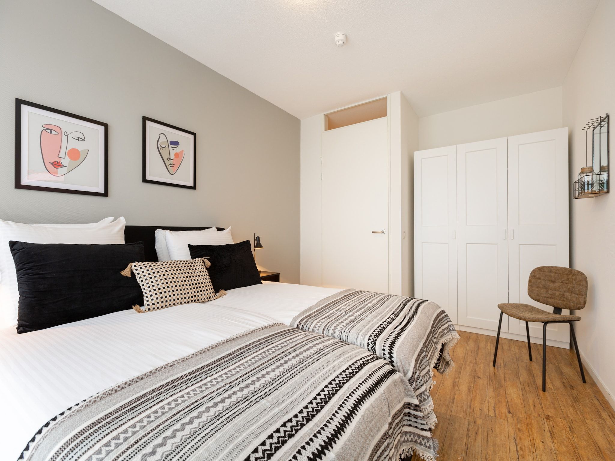 Een slaapkamer van Scheveningen Harbour 62 in Den Haag