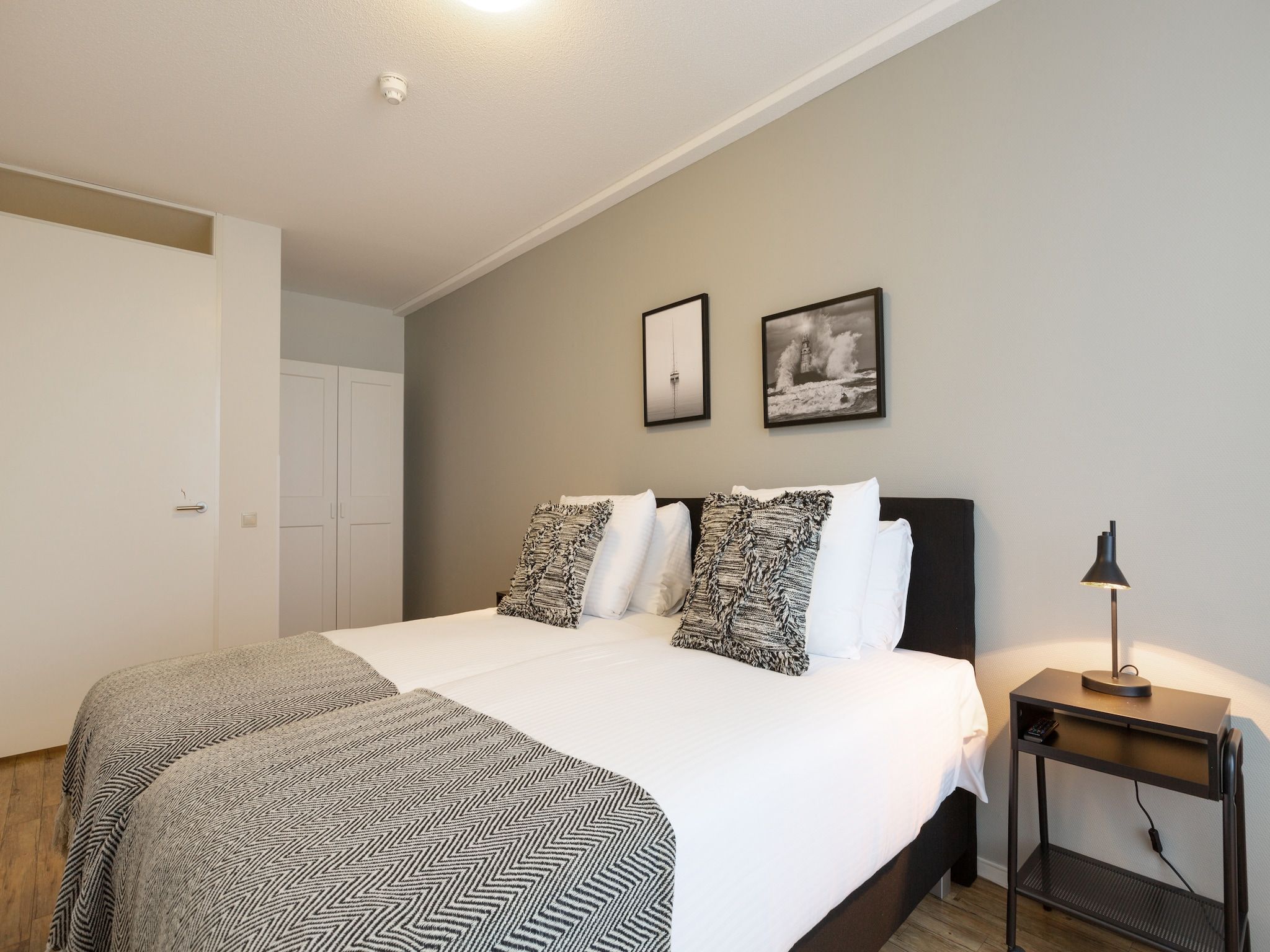 Een slaapkamer van Scheveningen Harbour 62 in Den Haag