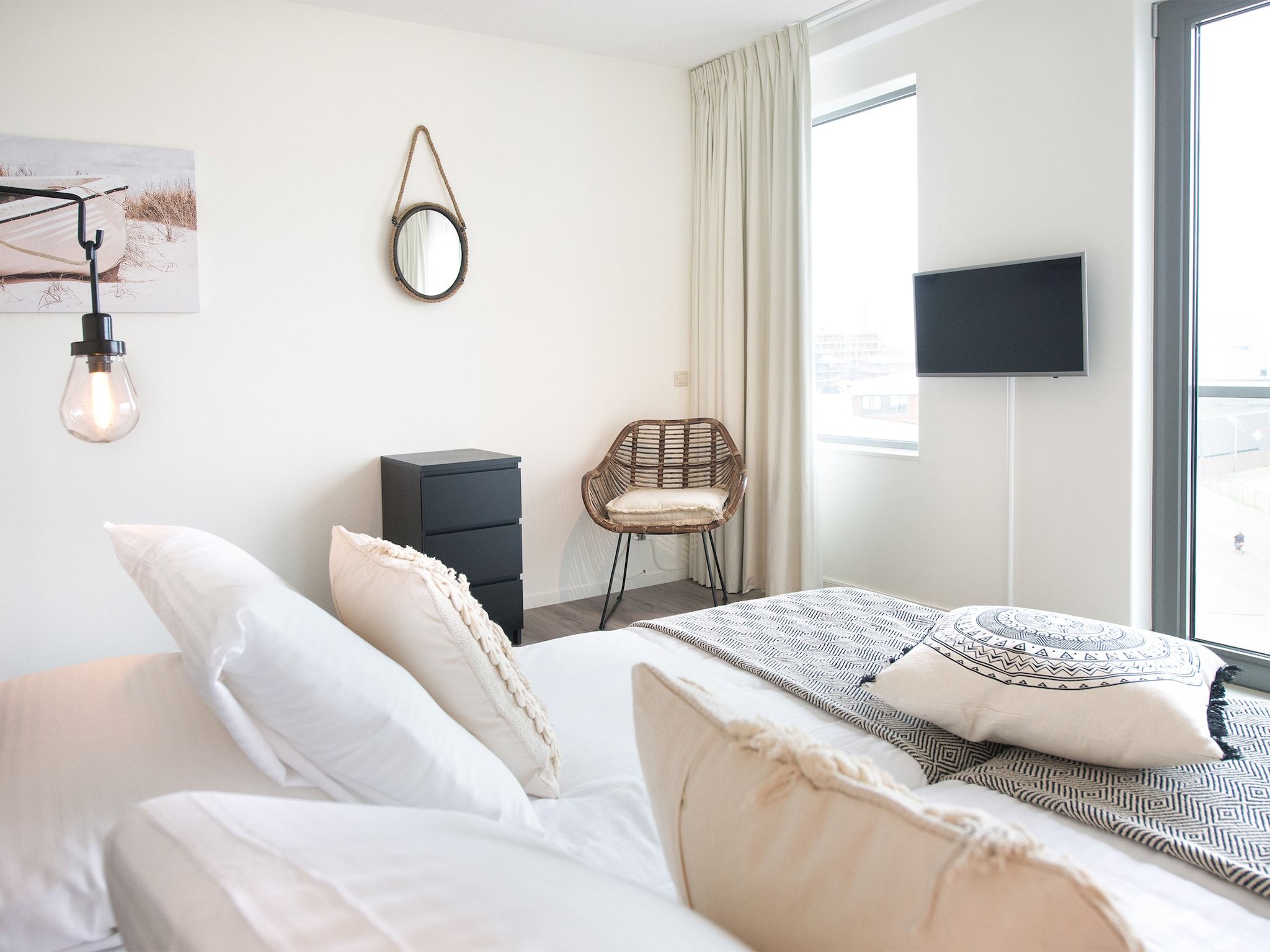 Een slaapkamer van Scheveningen Harbour 70 in Den Haag