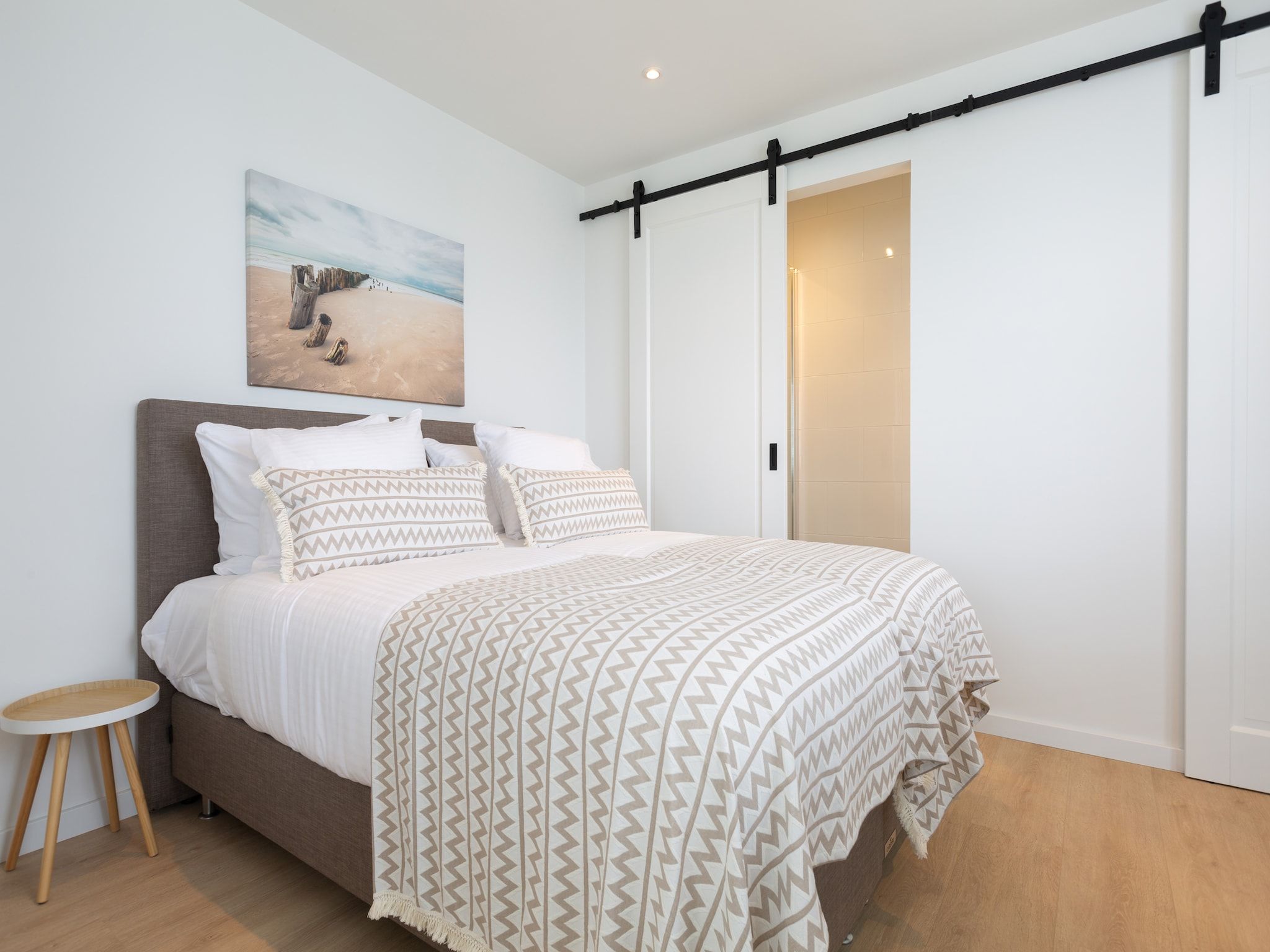 Een slaapkamer van Scheveningen Harbour 72A in Den Haag