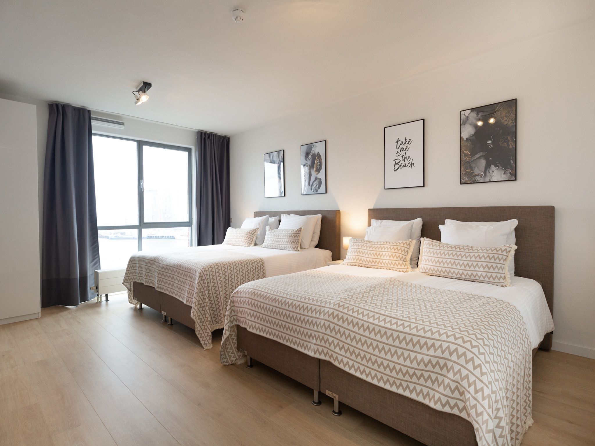 Een slaapkamer van Scheveningen Harbour 72A in Den Haag