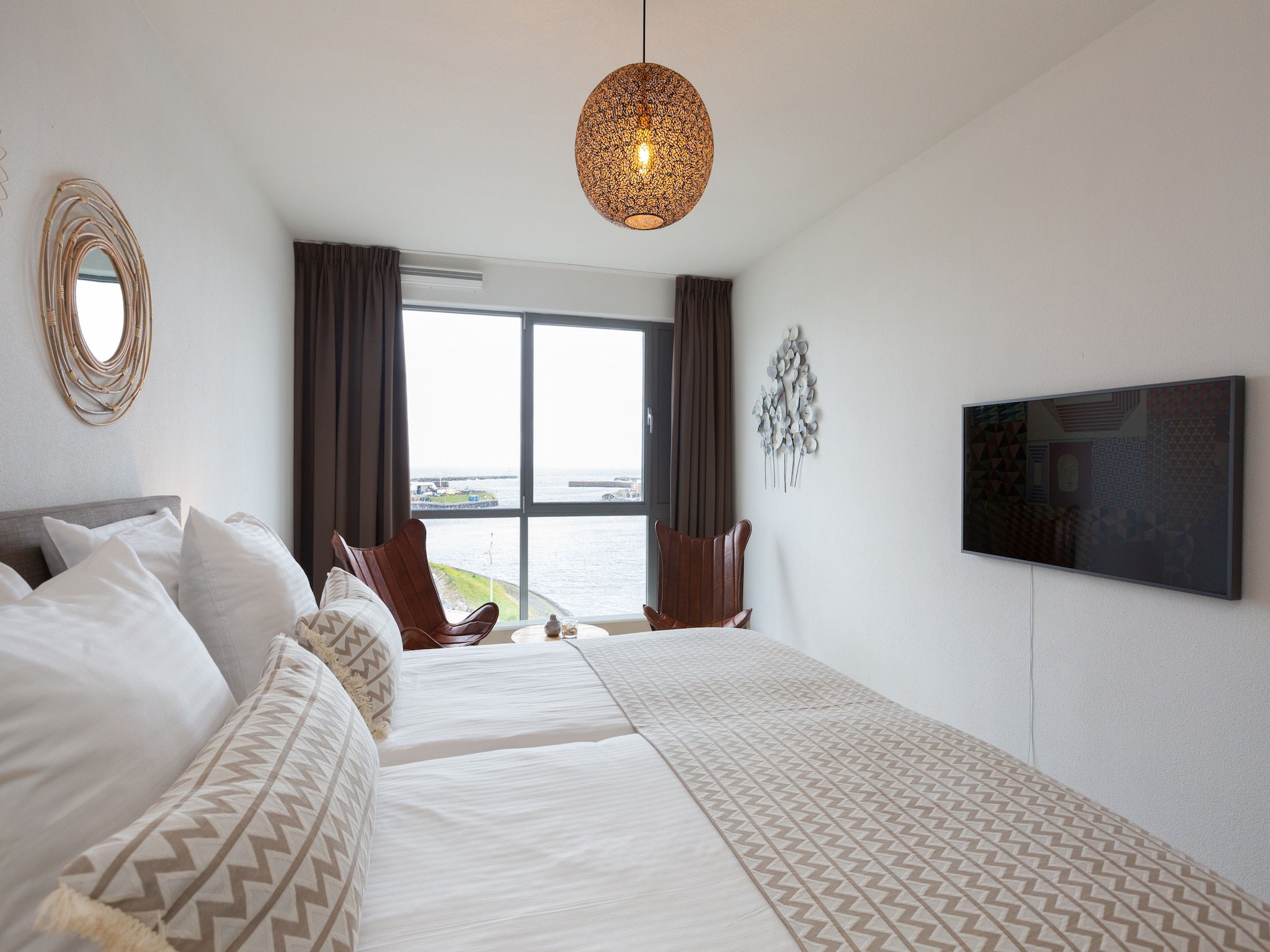 Een slaapkamer van Scheveningen Harbour 72A in Den Haag