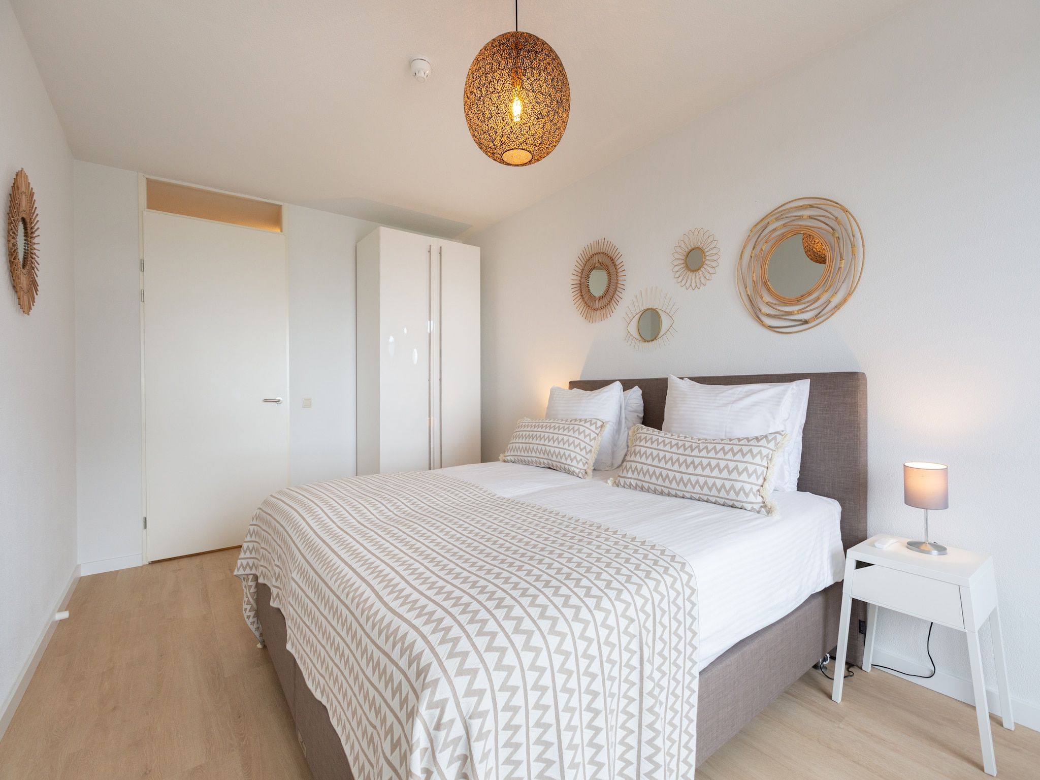 Een slaapkamer van Scheveningen Harbour 72A in Den Haag