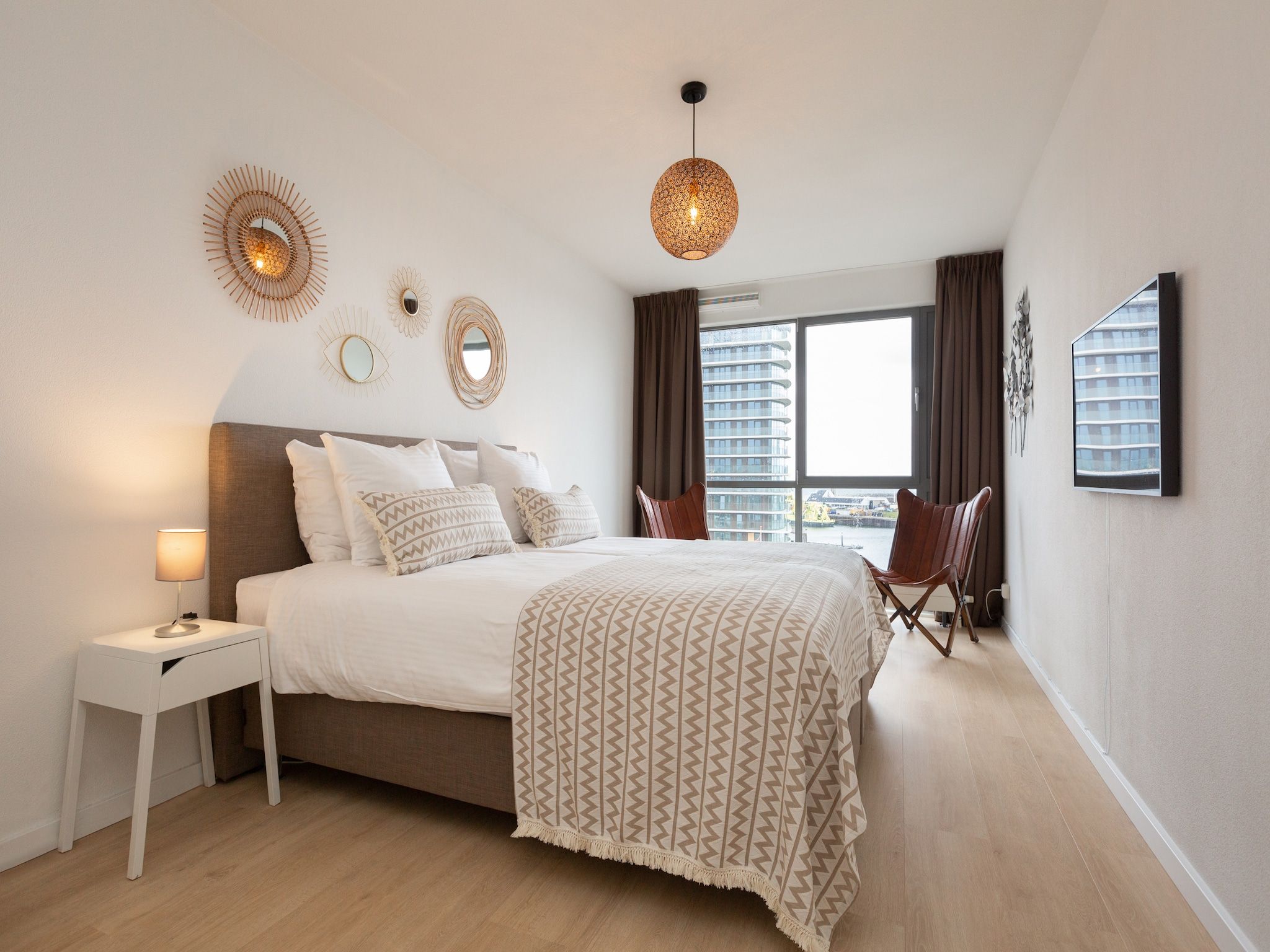 Een slaapkamer van Scheveningen Harbour 72A in Den Haag