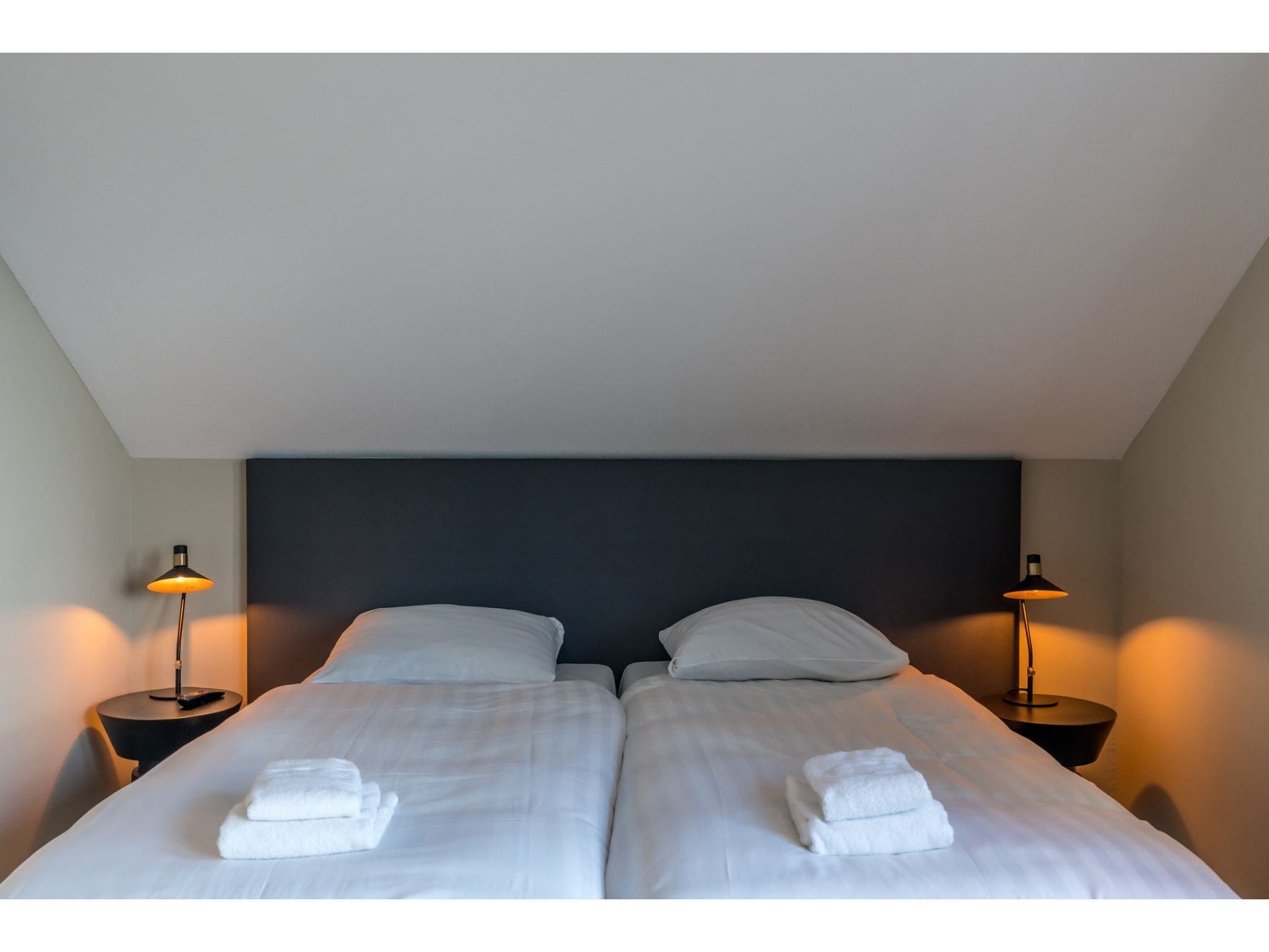 Een slaapkamer van O-Princenhof A 8 persoons in De Cocksdorp