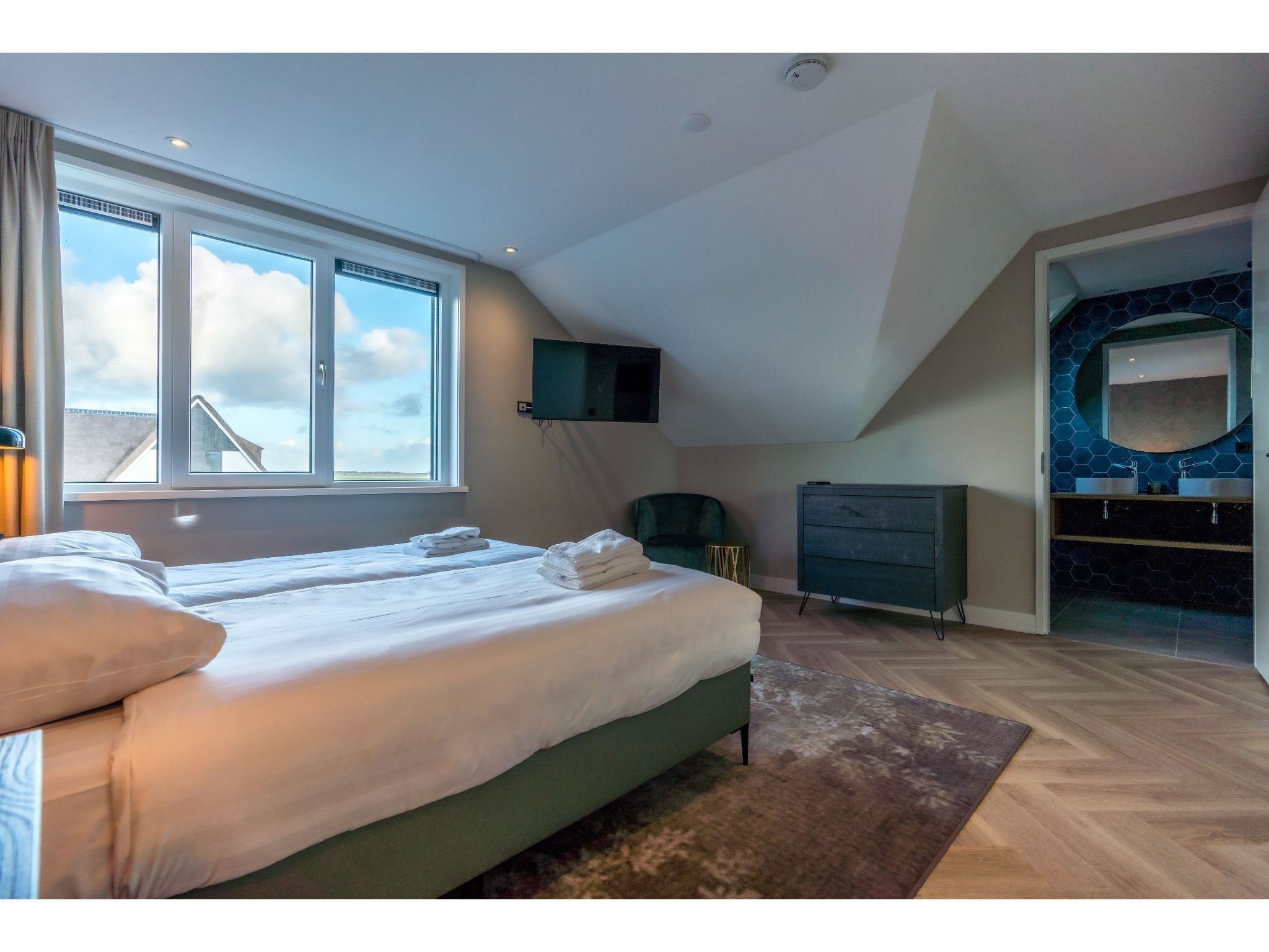 Een slaapkamer van O-Princenhof A 8 persoons in De Cocksdorp