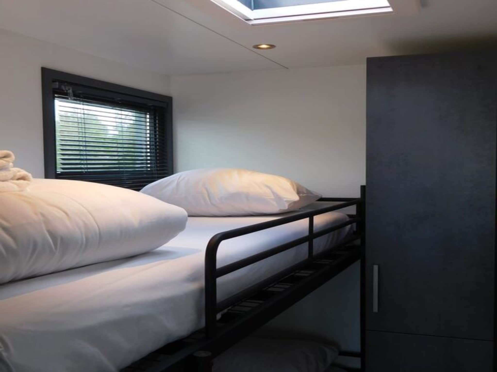 Een slaapkamer van Boot Zonder Naam in Volendam