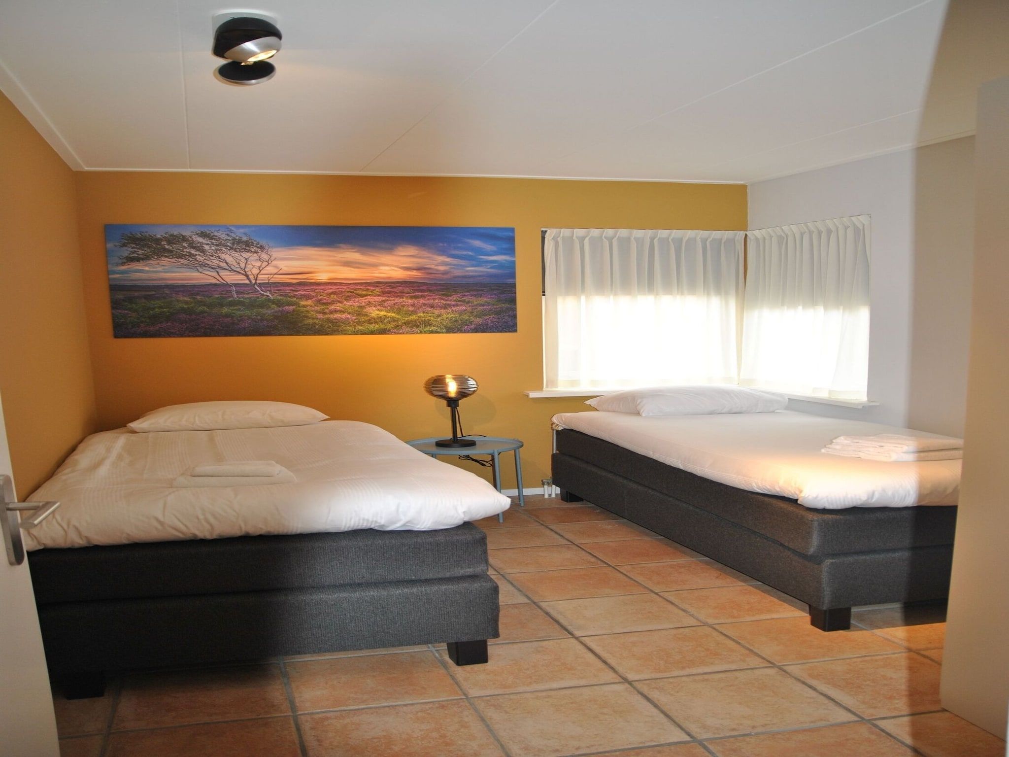 Een slaapkamer van Zilte Bries in De Koog Texel