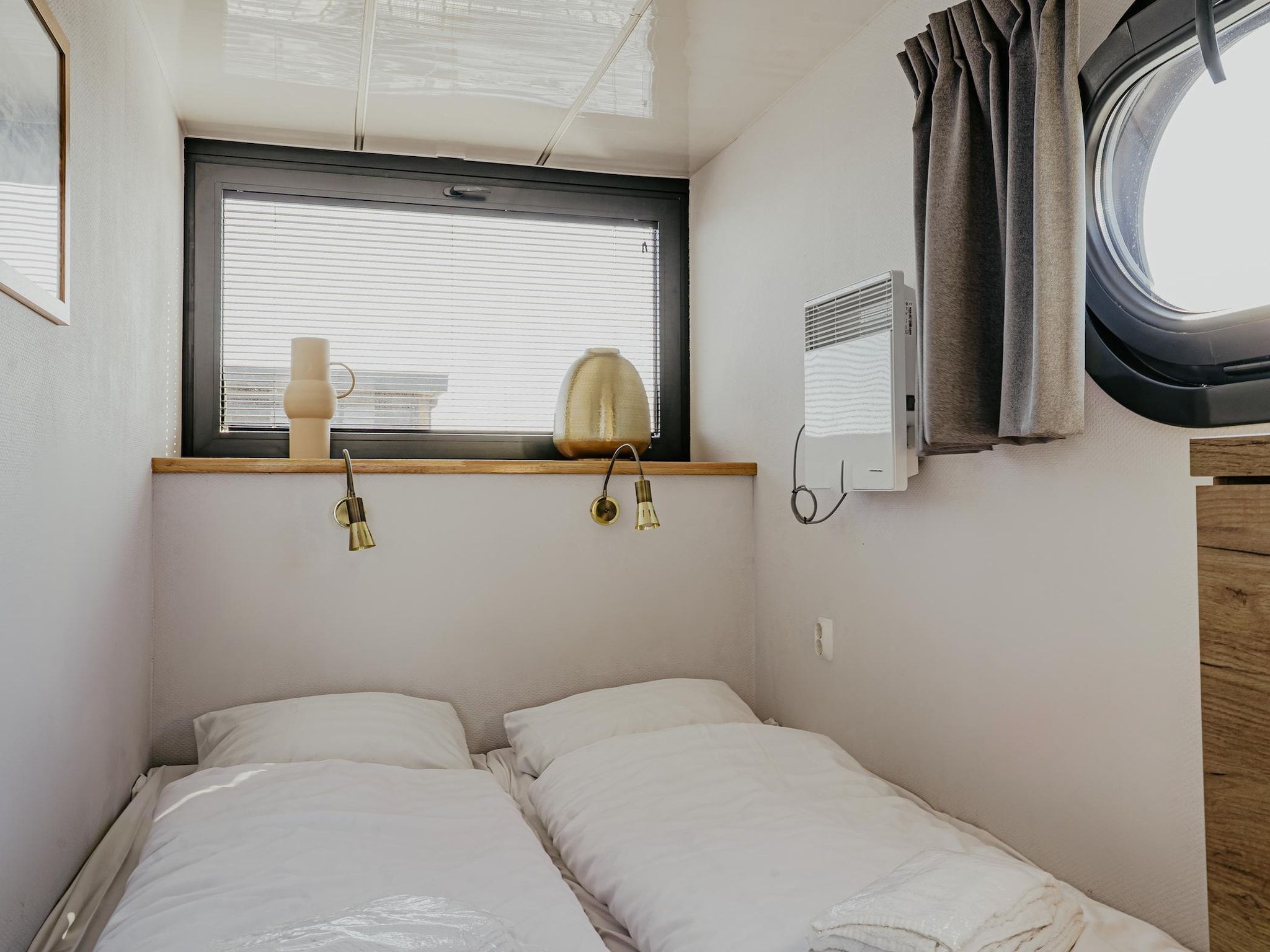 Een slaapkamer van Waterpark de Meerparel 10 in Uitgeest