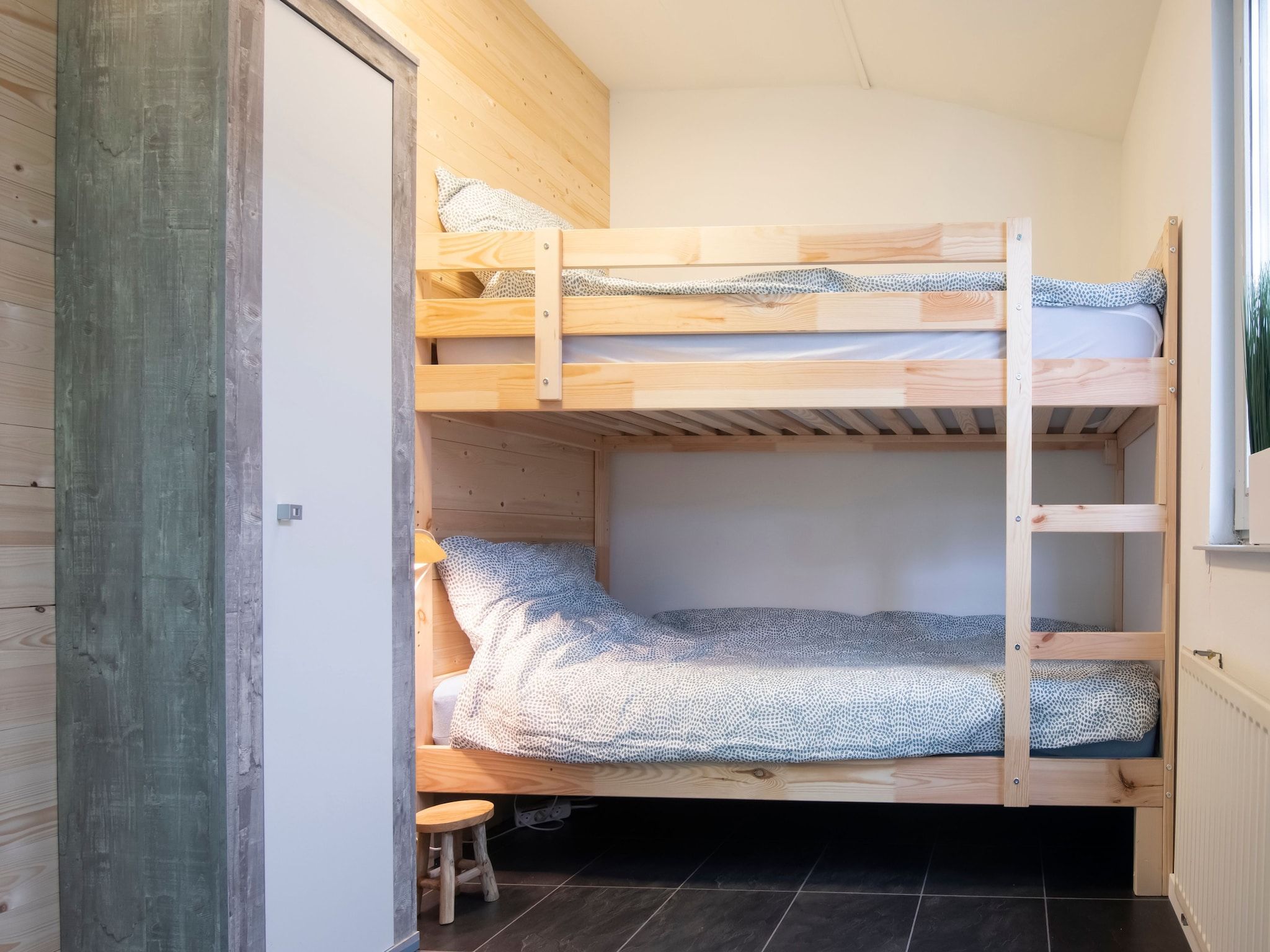 Een slaapkamer van Villa Avondrood in Ooltgensplaat