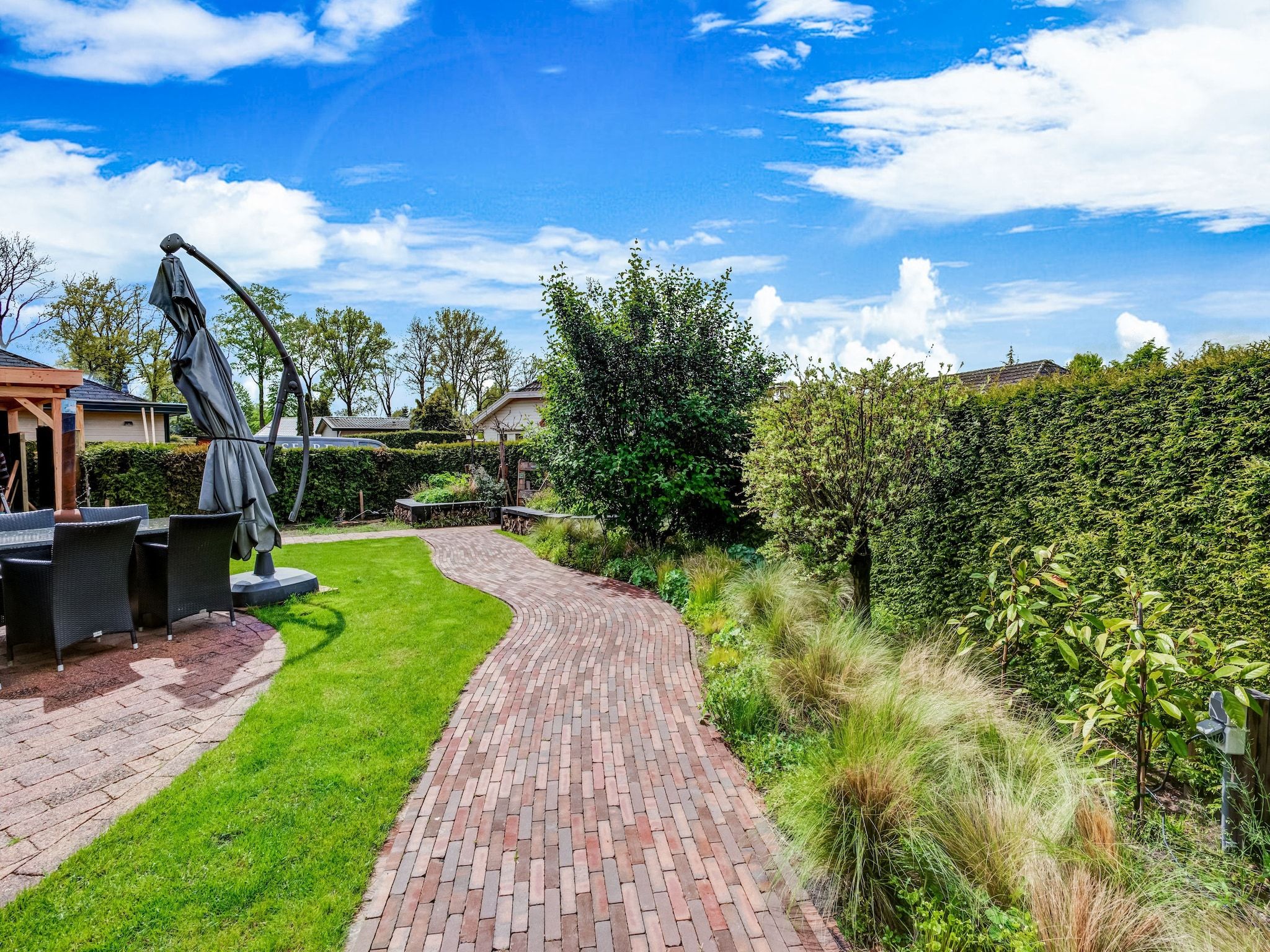 De tuin van Chalet Kieftveen Voorthuizen 6 pax in Voorthuizen