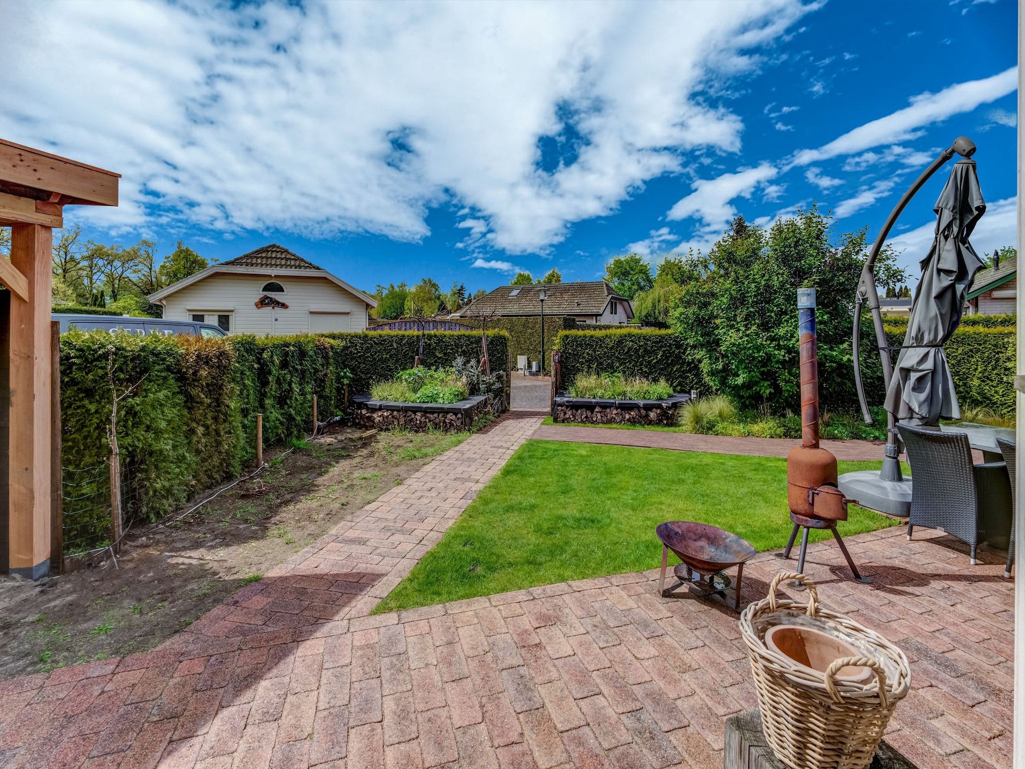 De tuin van Chalet Kieftveen Voorthuizen 6 pax in Voorthuizen