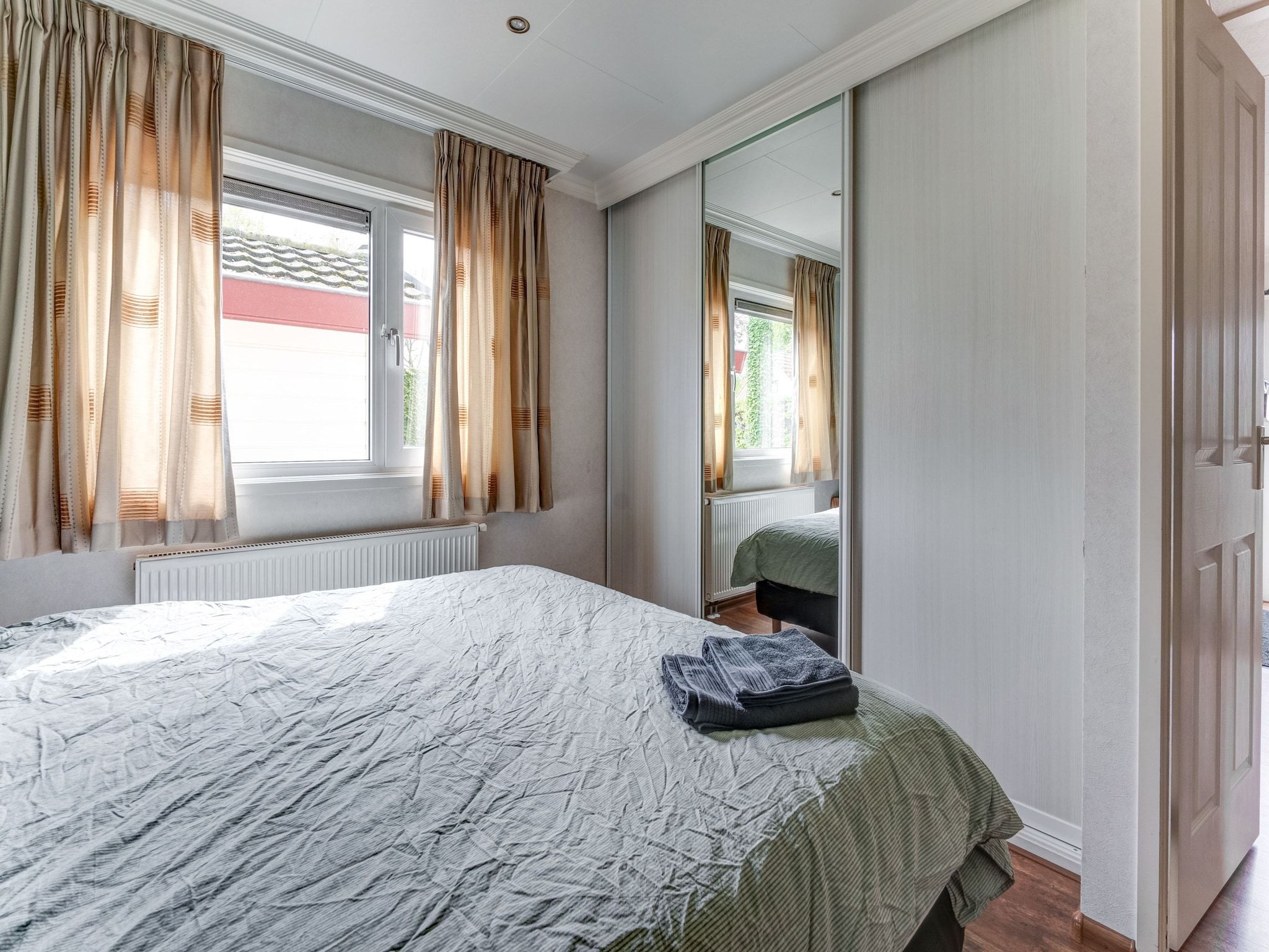 Een slaapkamer van Chalet Kieftveen Voorthuizen 6 pax in Voorthuizen