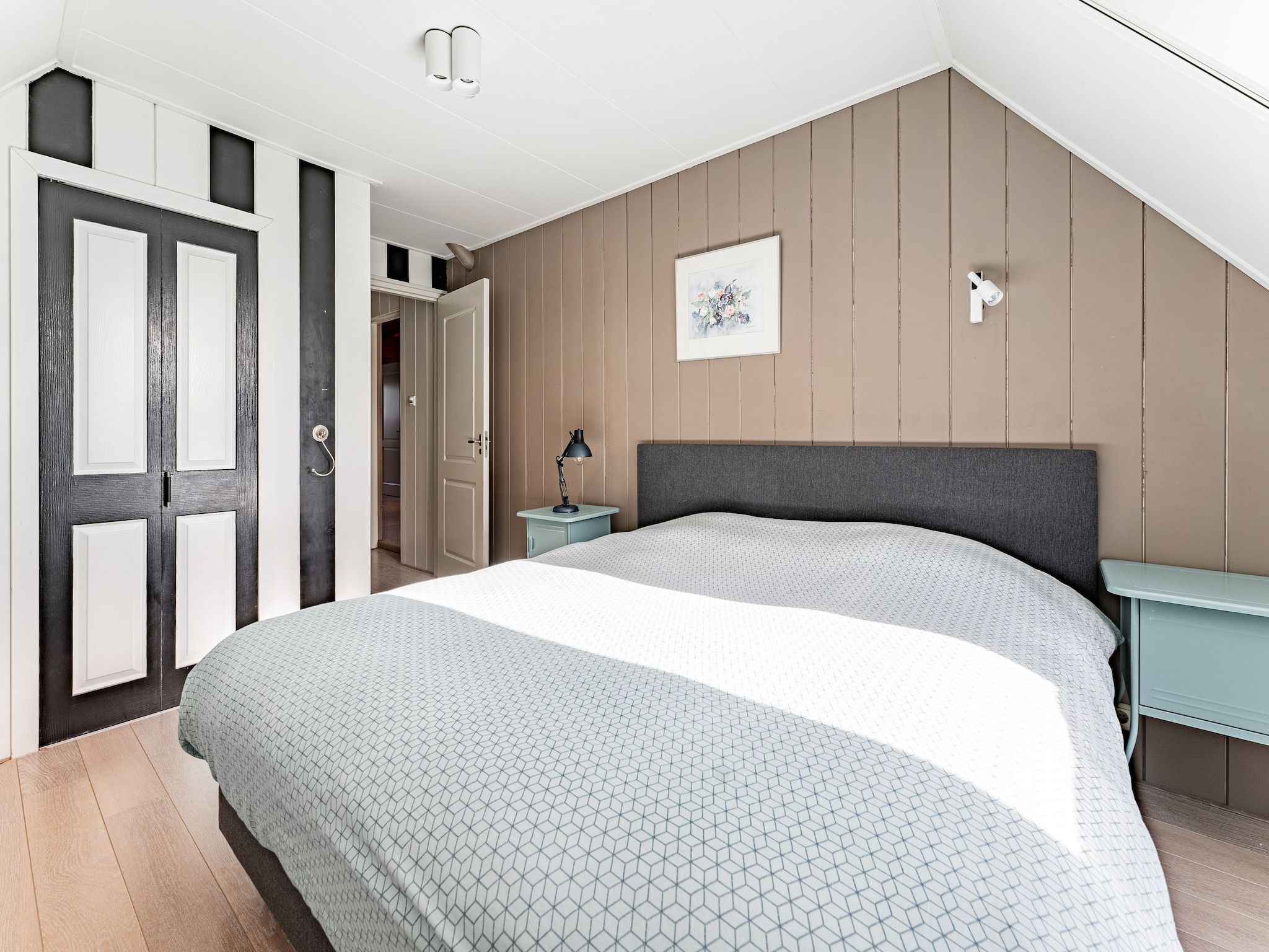 Een slaapkamer van De Pauwenhof in Heiloo