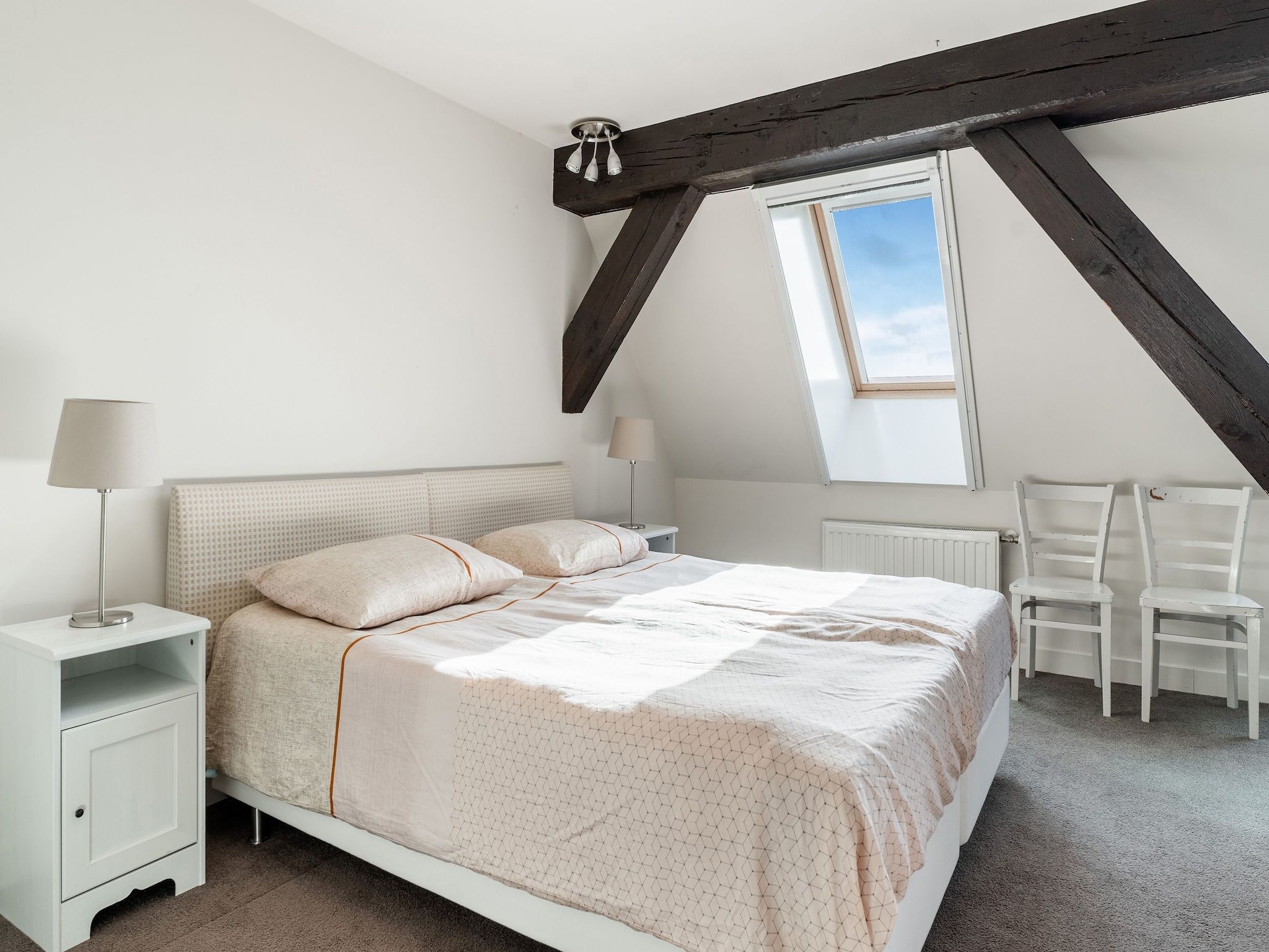 Een slaapkamer van De Pauwenhof in Heiloo